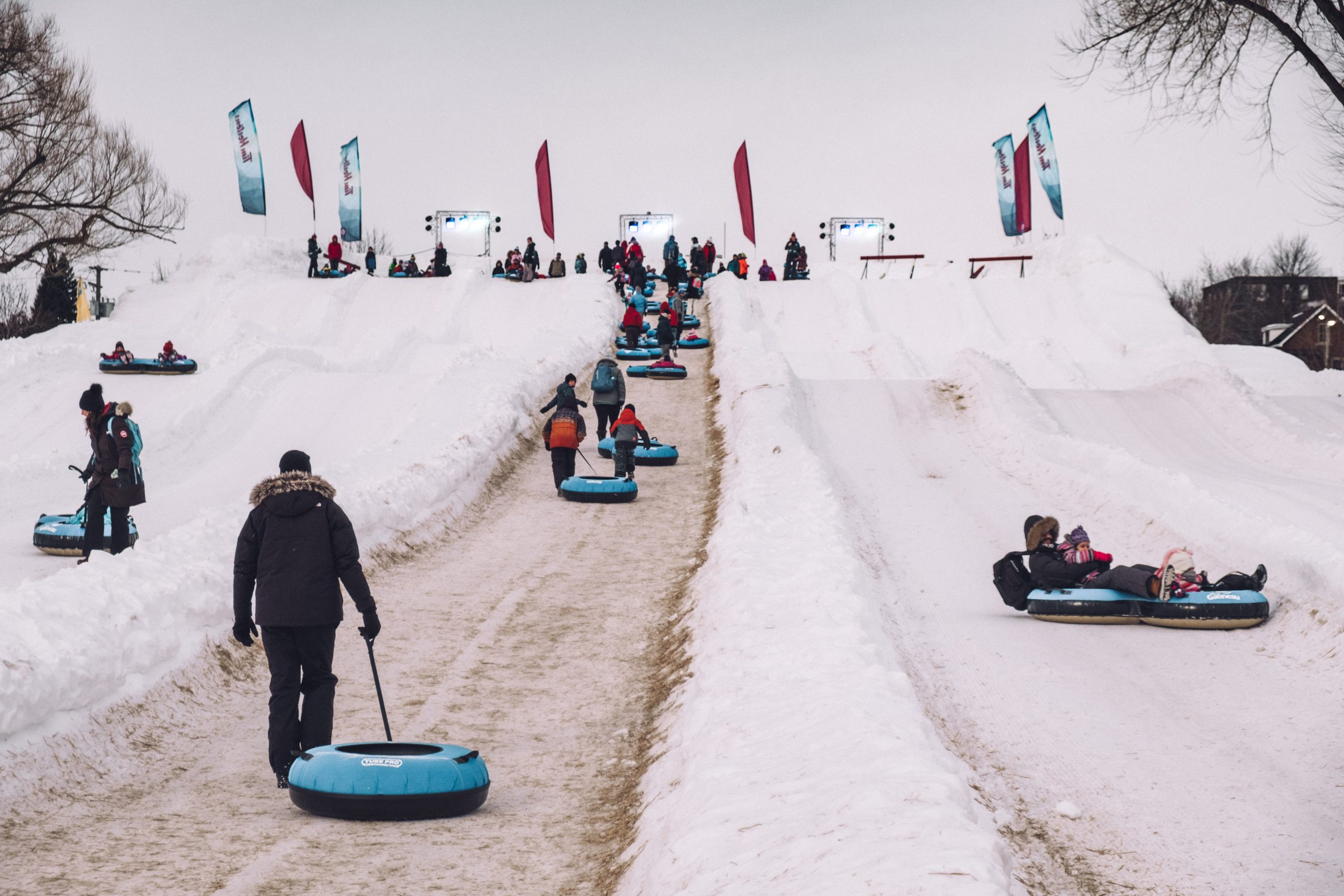 Adults sleds snowflake kingdom Canada