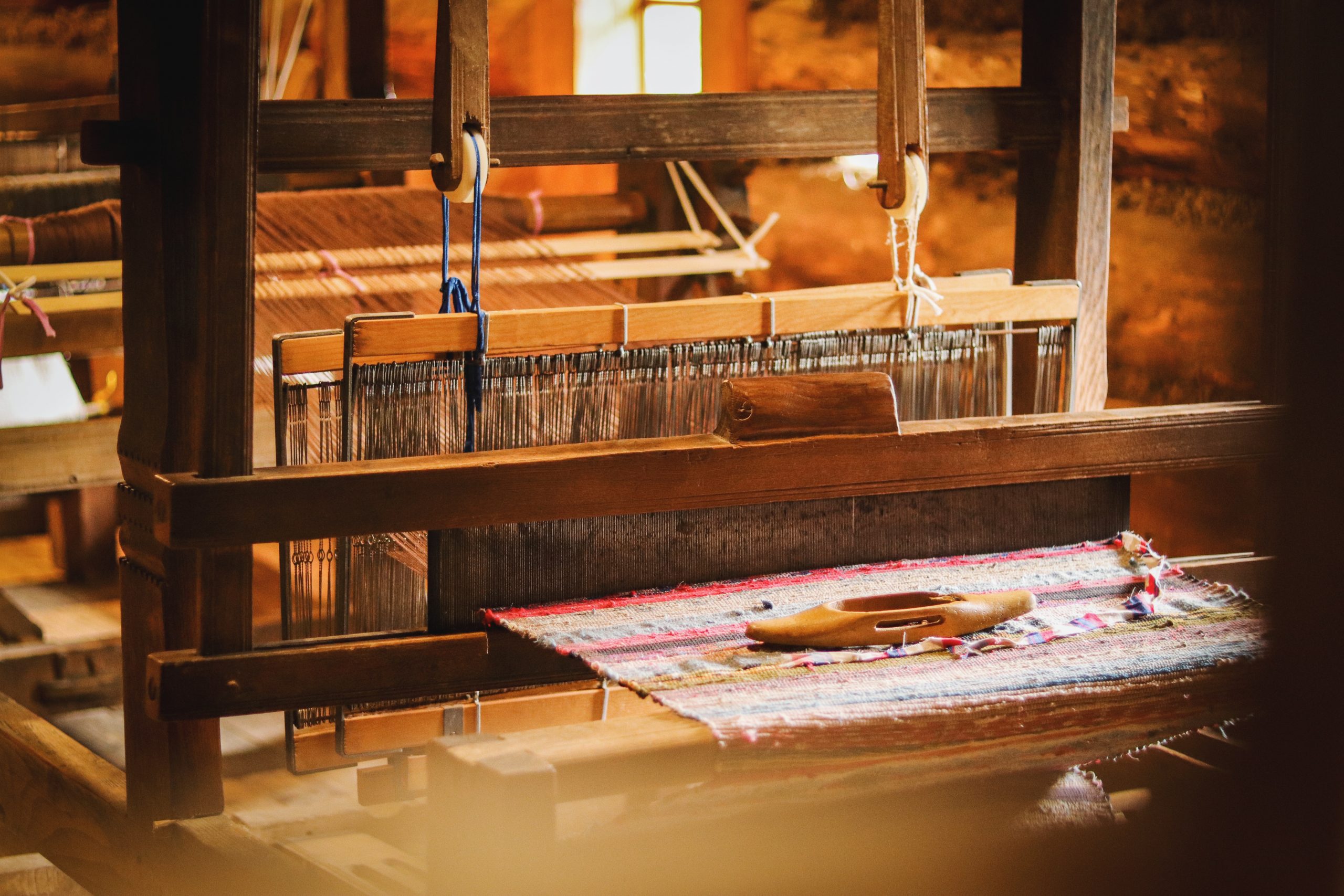 Authentic hand weaving is still a wonderful tradition for making hand made carpets in Romania