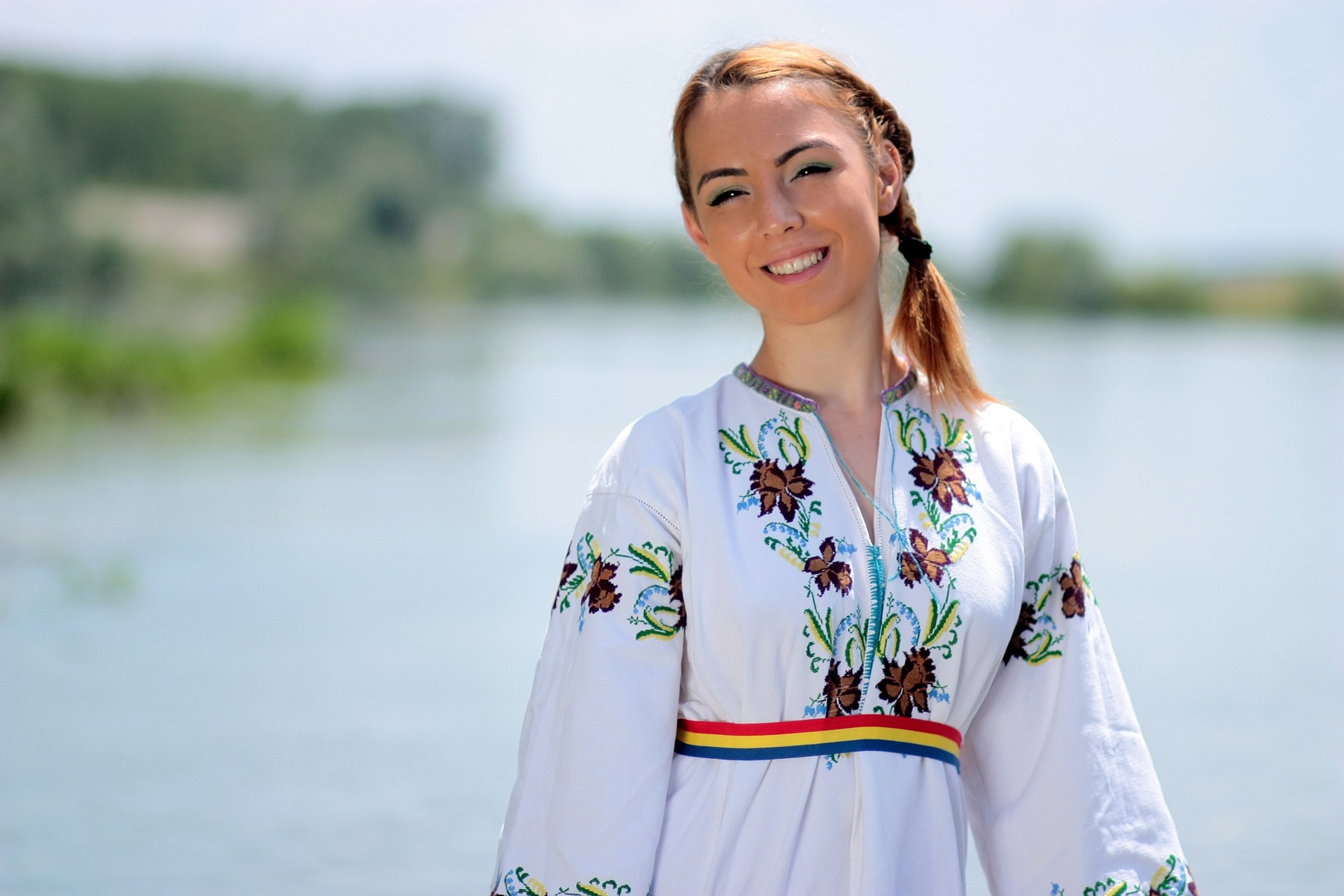 Authentic Romanian woman wearing a traditional Romanian blouse