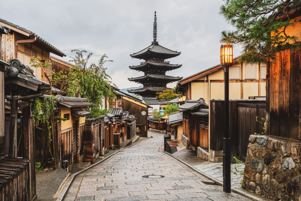 Beautiful morning at Yasaka Pagoda and Sannen Zaka Street in summer, Kyoto, Japan. Yasaka Pagoda is the famous landmark and travel attraction of Kyoto.