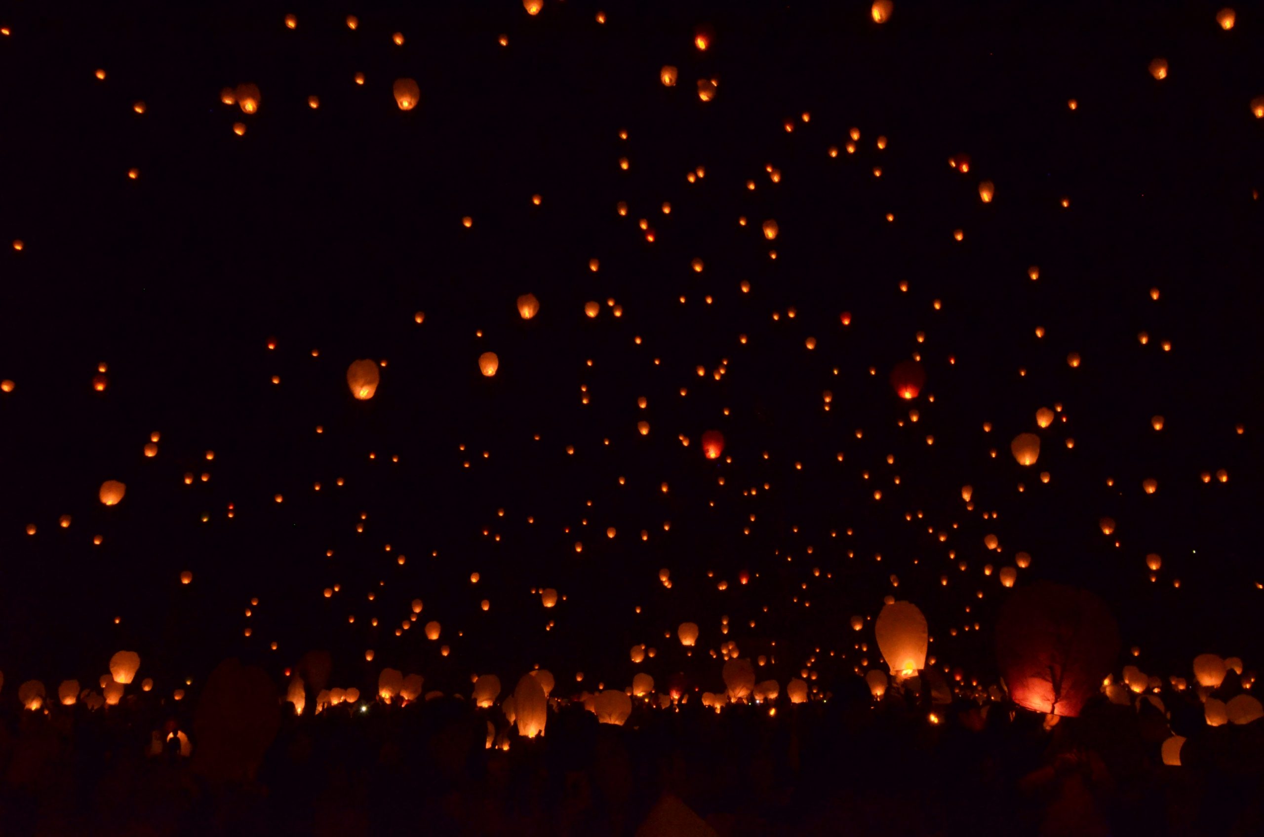 Beautiful night sky with paper lanterns floating