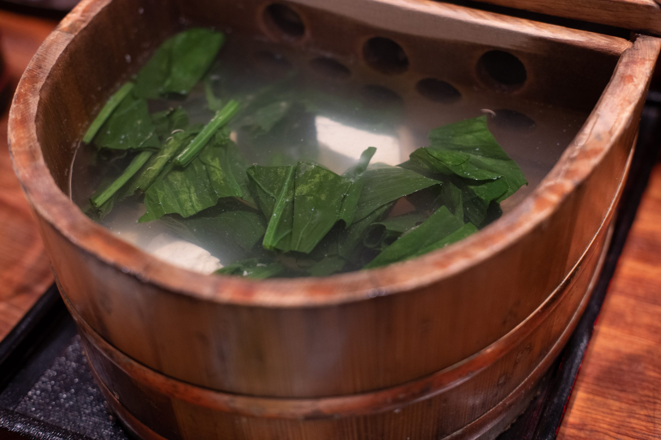 Boiled yudofu in a Japanese hot pot Boiled yudofu in a Japanese hot pot