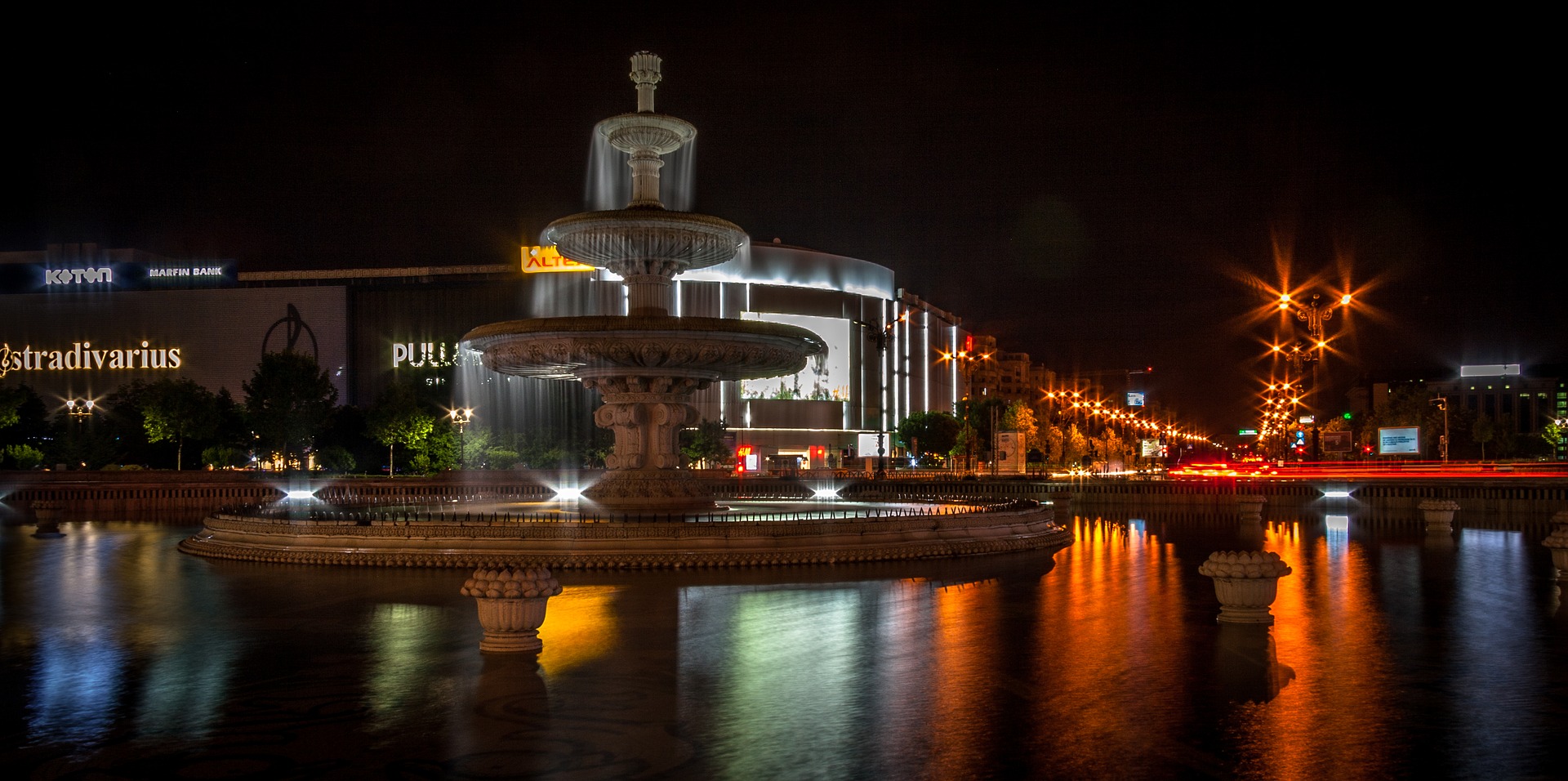 Bucharest Union Square - Piata Unirii with fountains at night