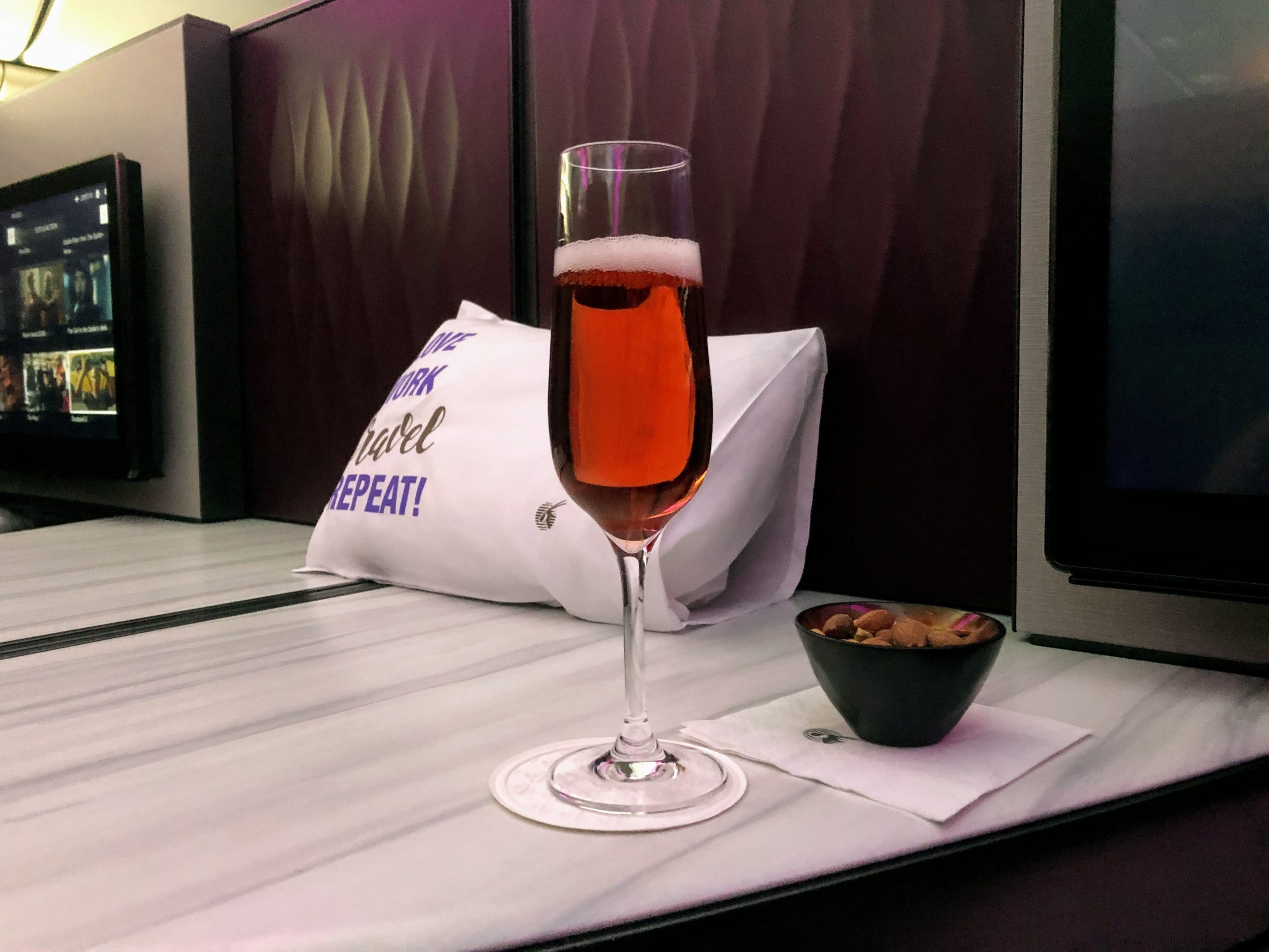 Champagne on arrival and warm nuts on Qatar Business