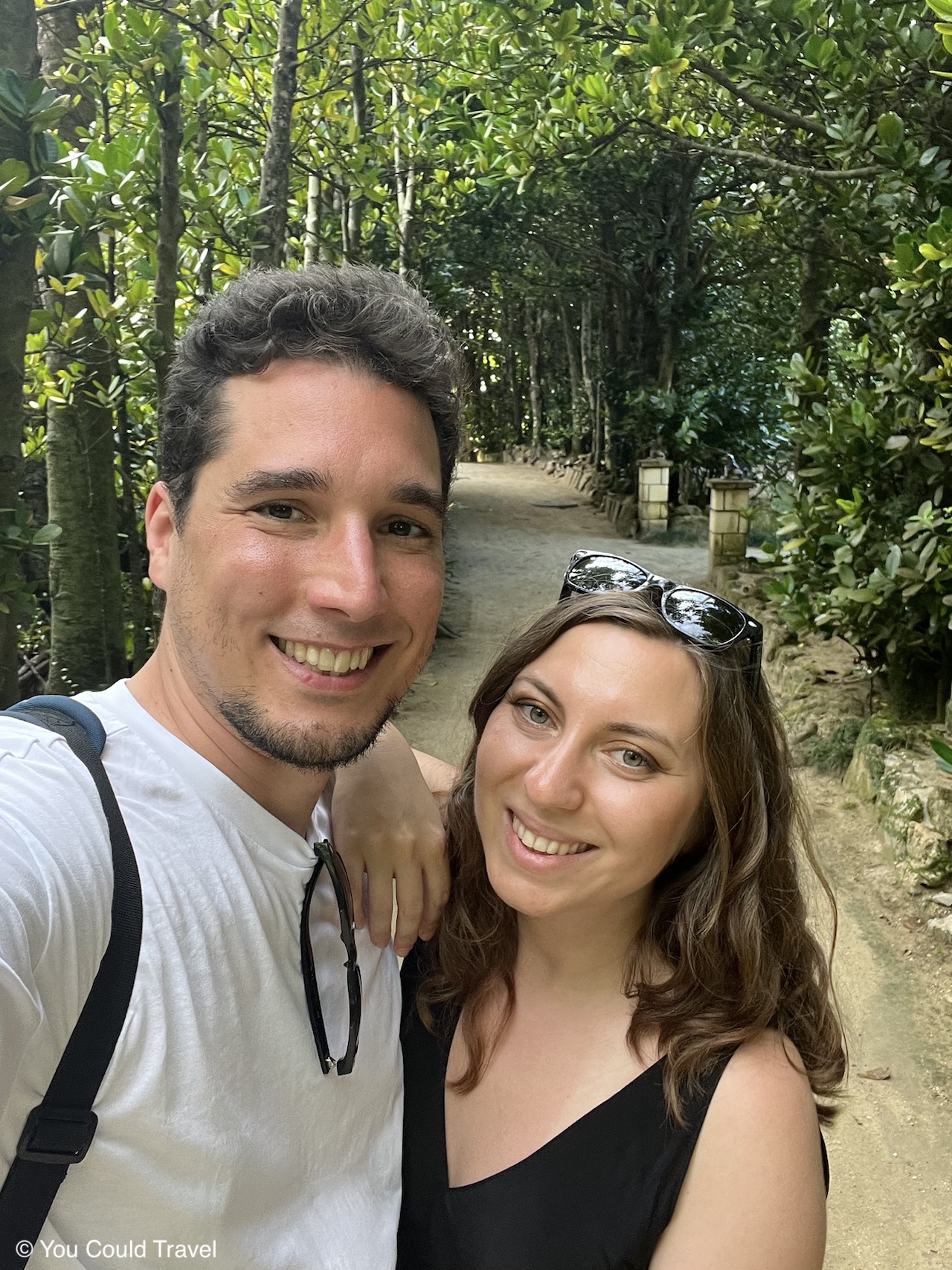 Cory and Greg from You Could Travel exploring the Bise Fukugi Tree Road in Okinawa