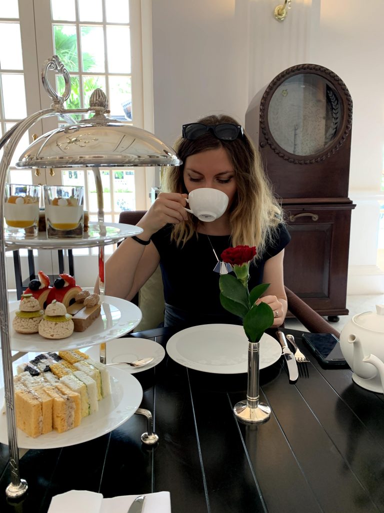 Cory enjoying her loose leaf tea at Raffles Singapore