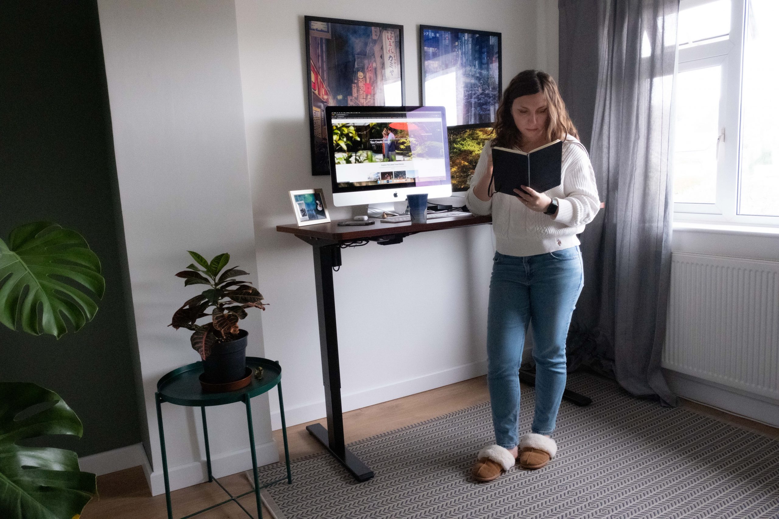 Cory enjoying her standing desk while working