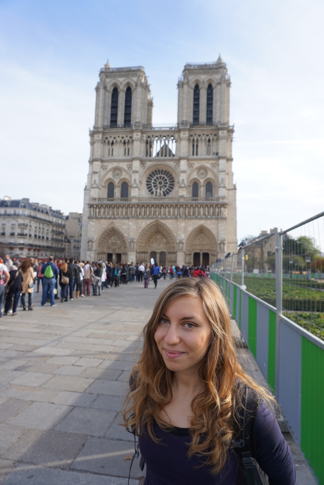 Cory exploring the notre dame cathedral in the 4th district, one of the top locations to stay in Paris
