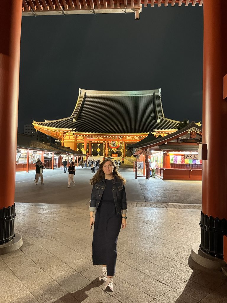 Cory from You Could Travel exploring Senso-ji at night