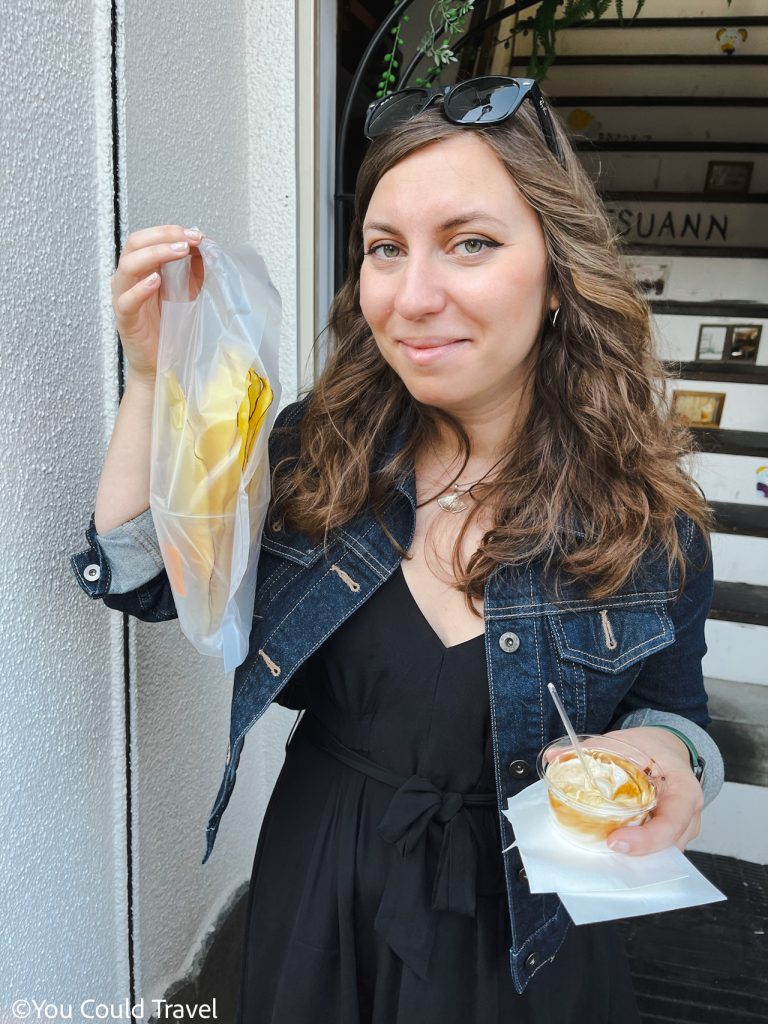 Cory holding sweet potato chips from Koedo Osatsuan Kawagoe