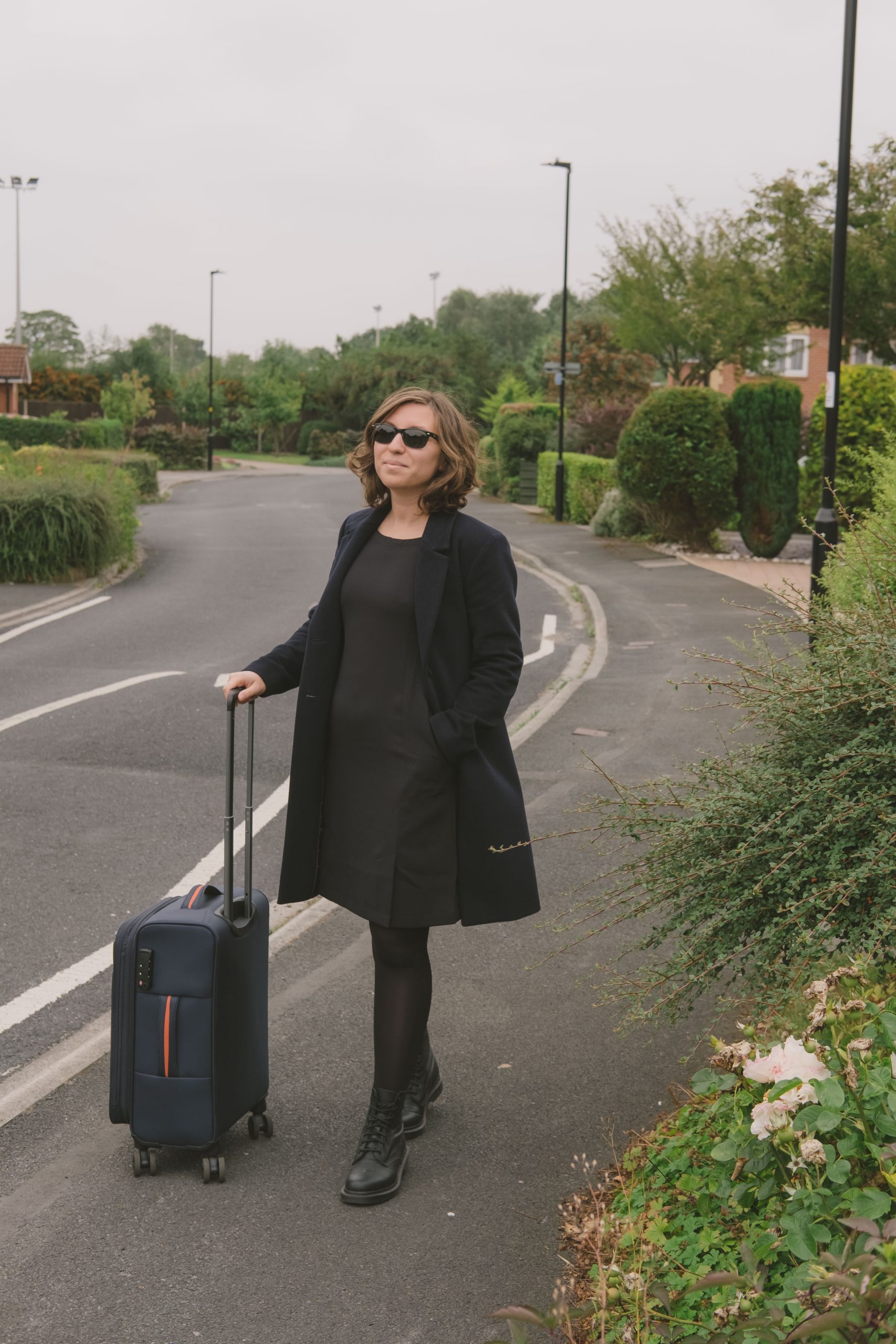 Cory travelling with her Trevi dress from Bluffworks