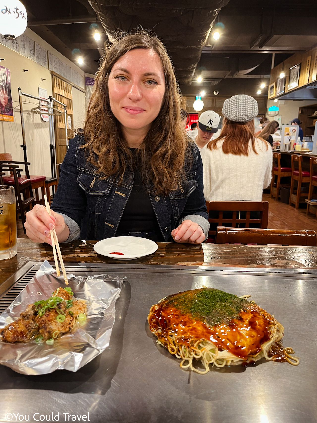 Cory very happy at Nagataya, an okonomiyaki restaurant