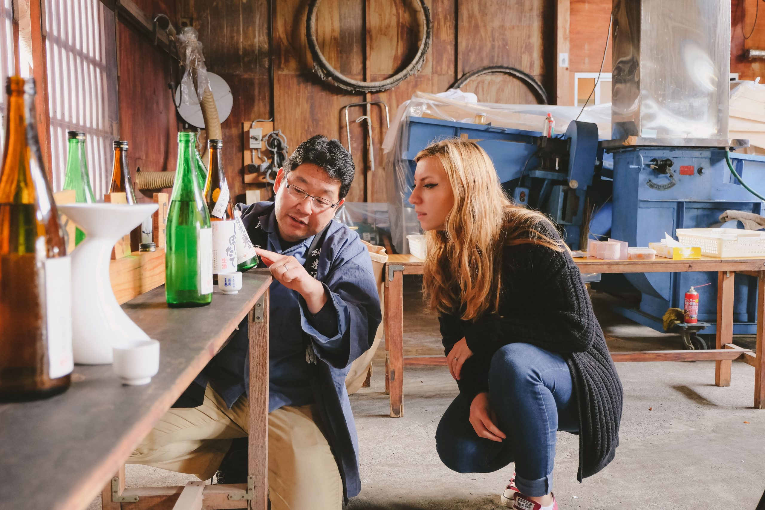 Must try in Japan: Cory visiting a local sake brewery and taking to the owner about how sake is produced Must try in Japan: Cory visiting a local sake brewery and taking to the owner about how sake is produced