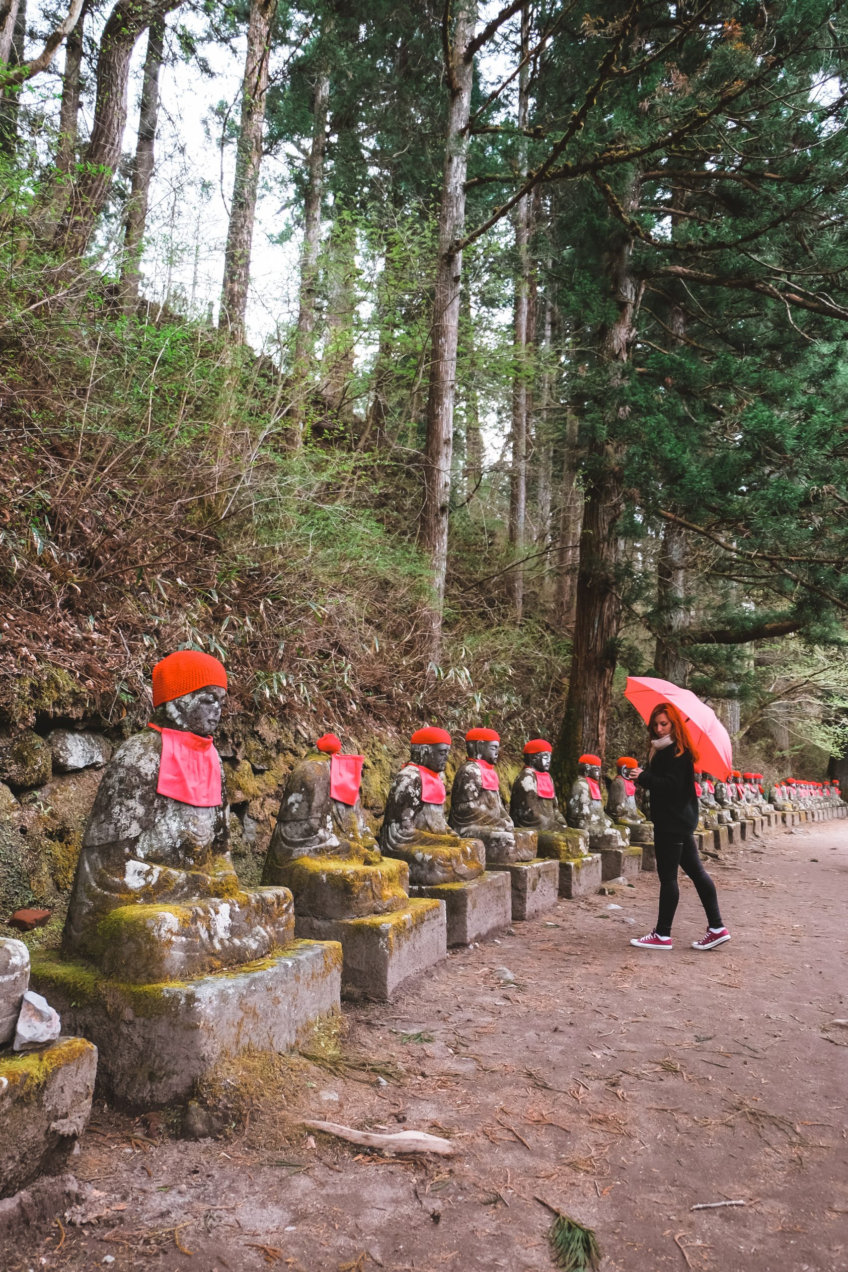 Cory from You Could Travel walking along the Kanmangafuchi Abyss