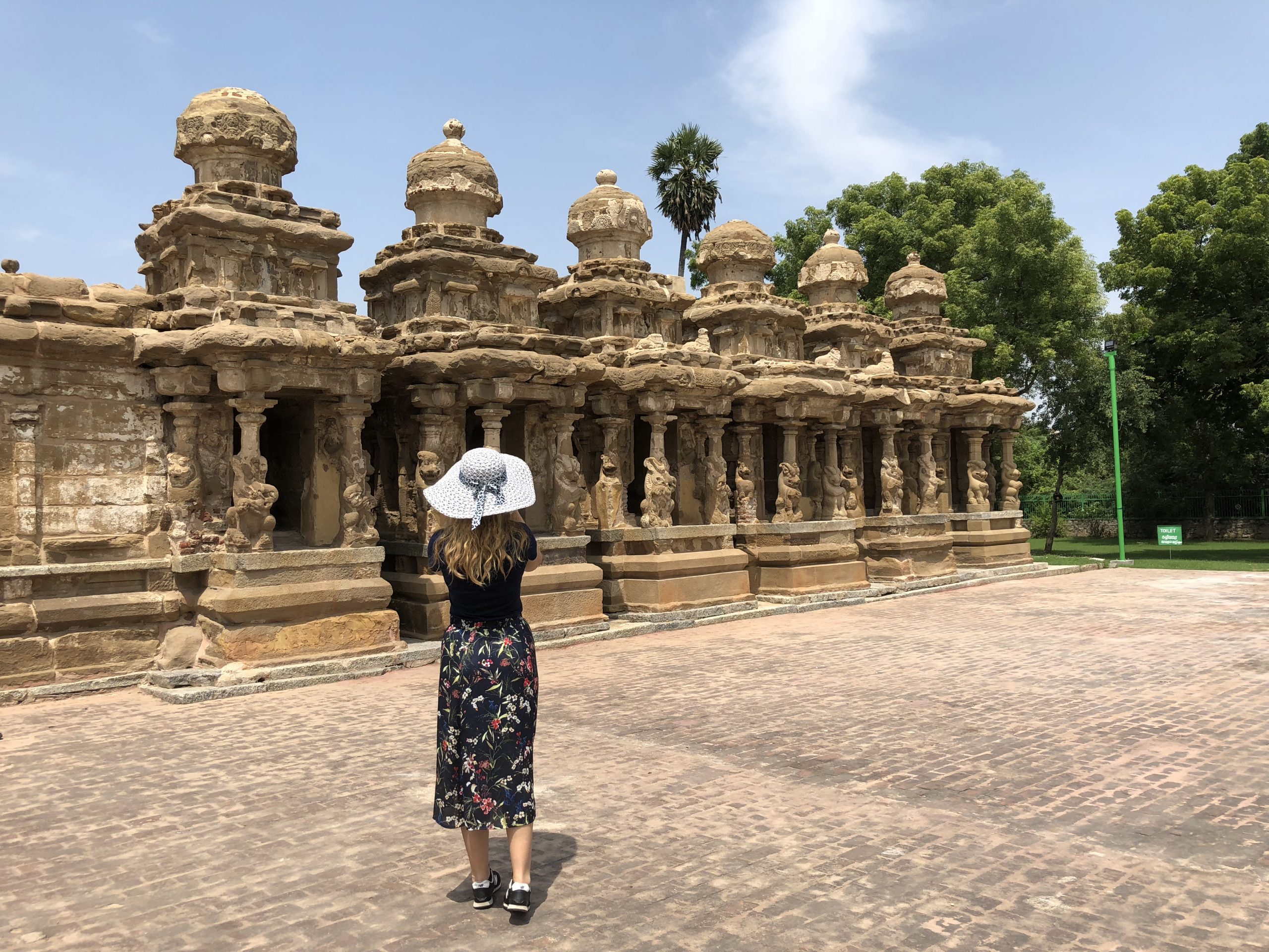 Cory wearing a hat and modest clothes in India