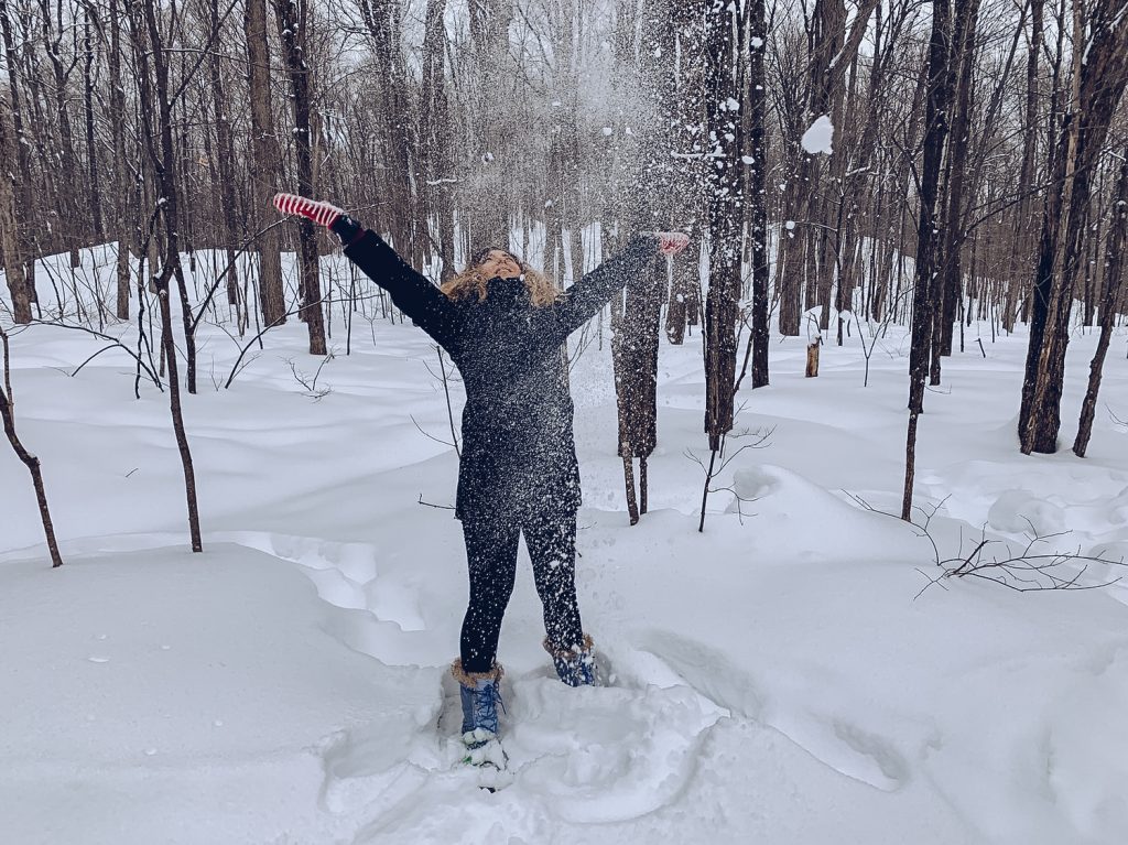 Explore Canada Cory throwing snow