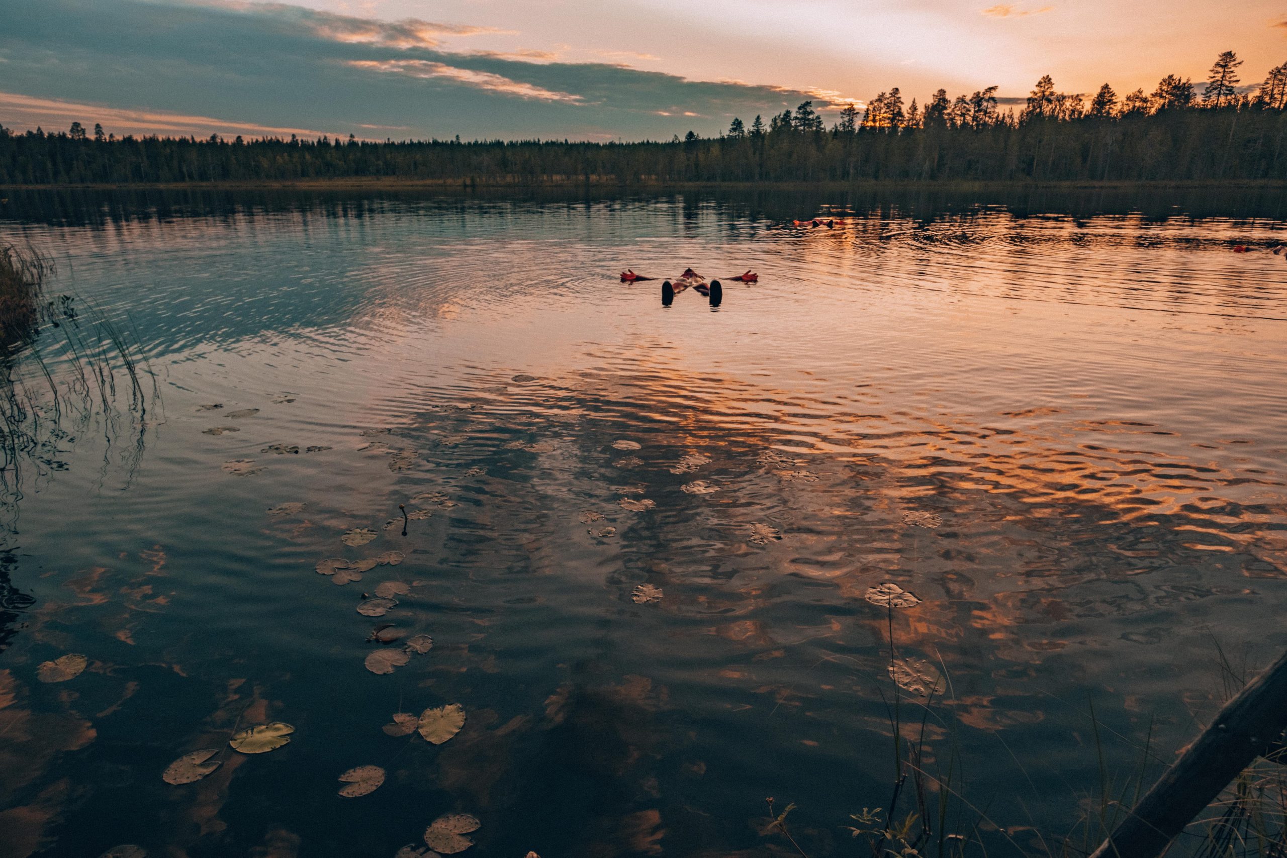 Float on a remote Lappish Lake in Finland Float on a remote Lappish Lake in Finland