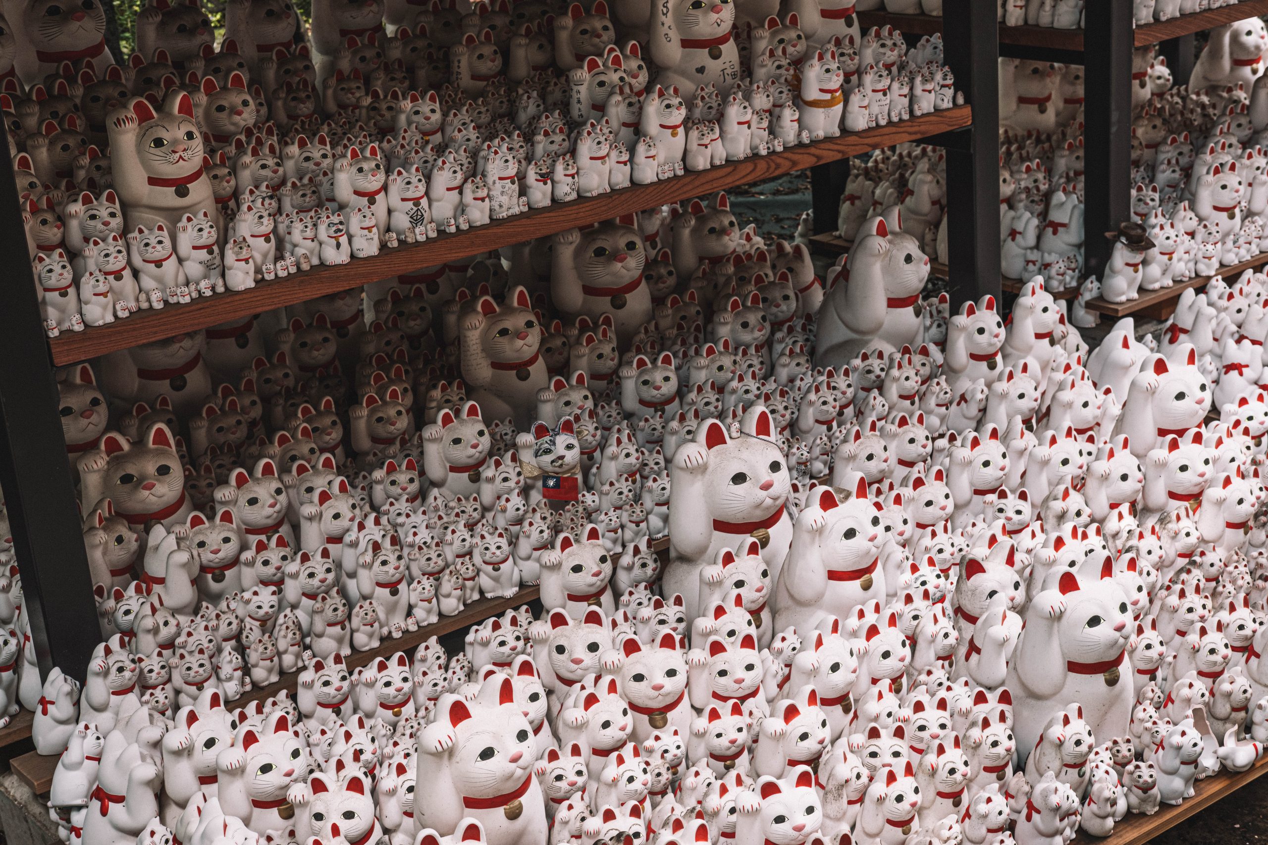 Free standing manekineko figurines at the Gotokuji temple, Tokyo