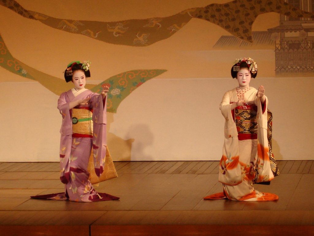 Two maiko performing in Kyoto, Japan