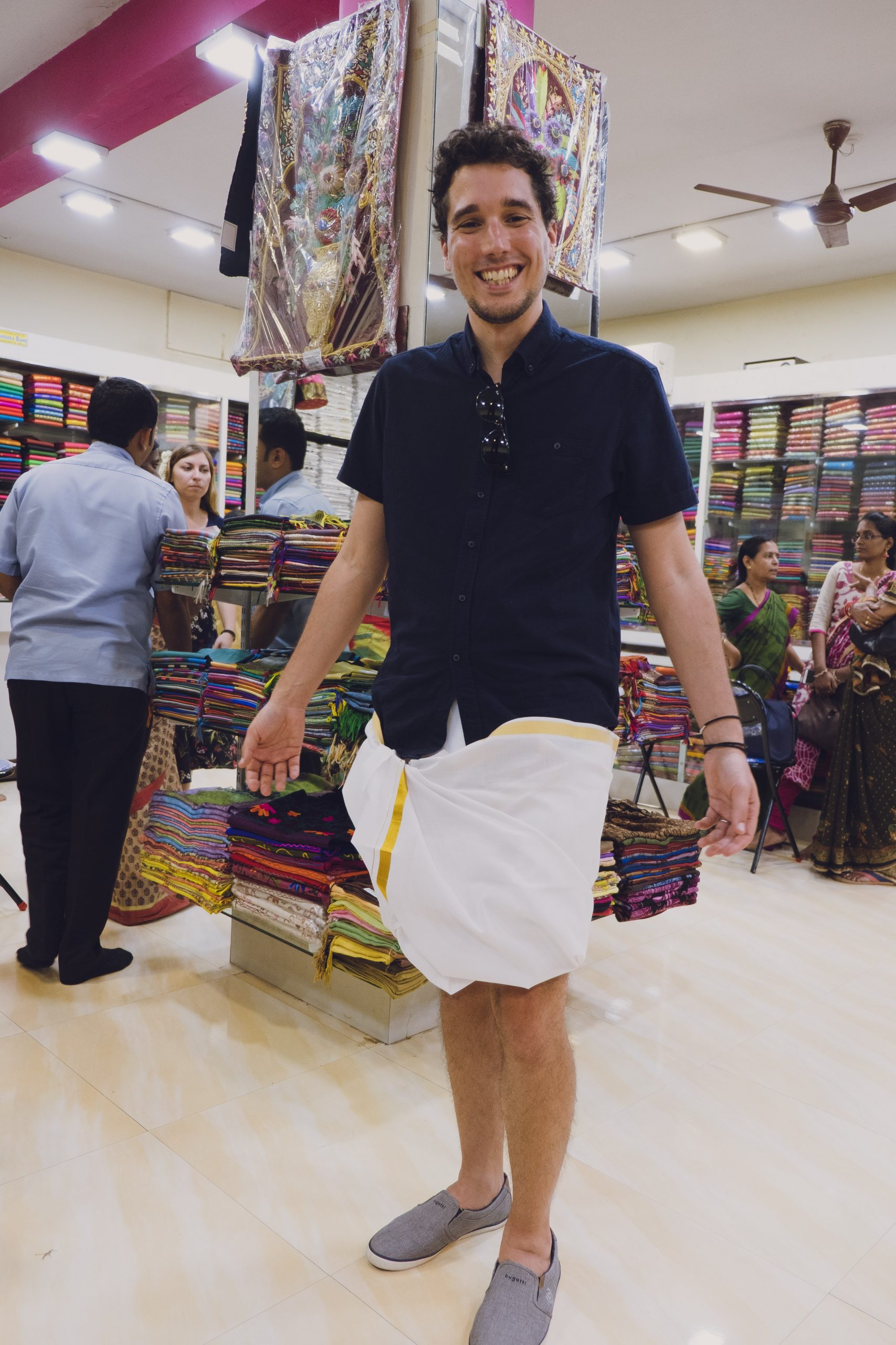G from You Could Travel trying on Indian clothes for men