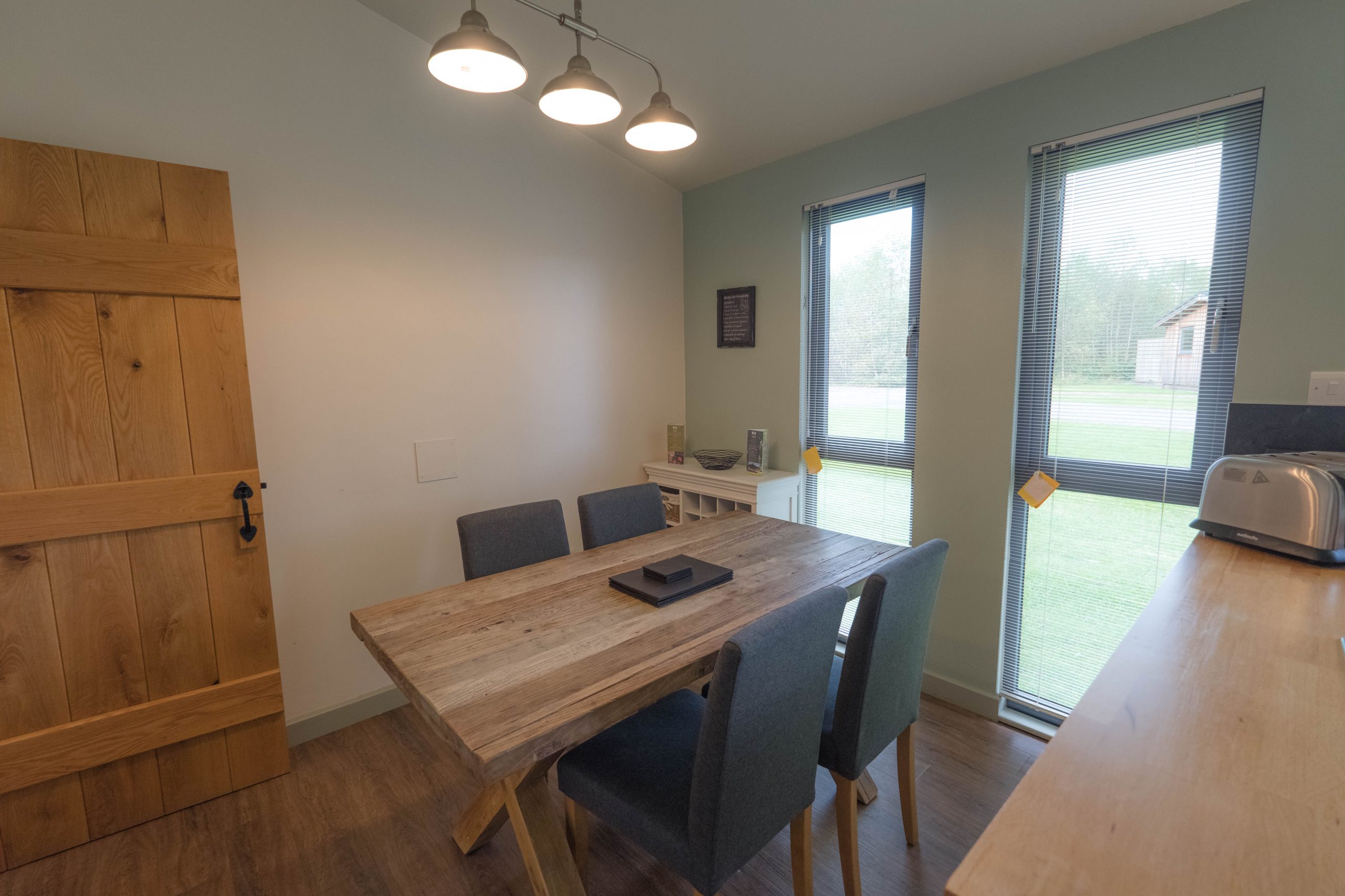 Gorgeous dining space with solid wood table