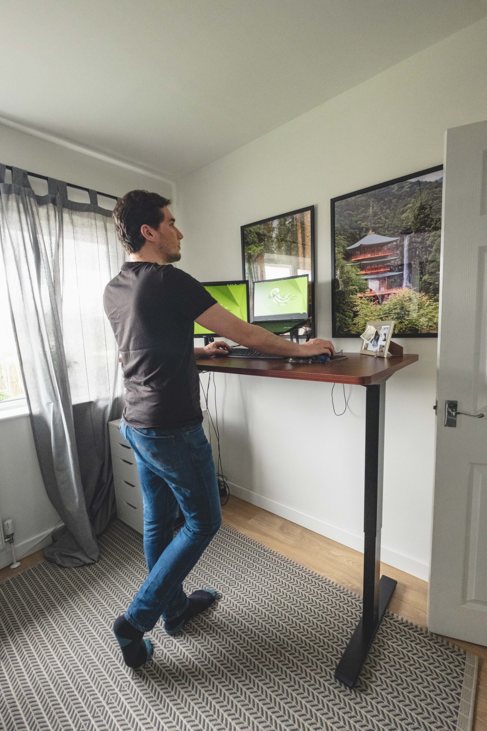 Greg working at his Flexispot standing desk