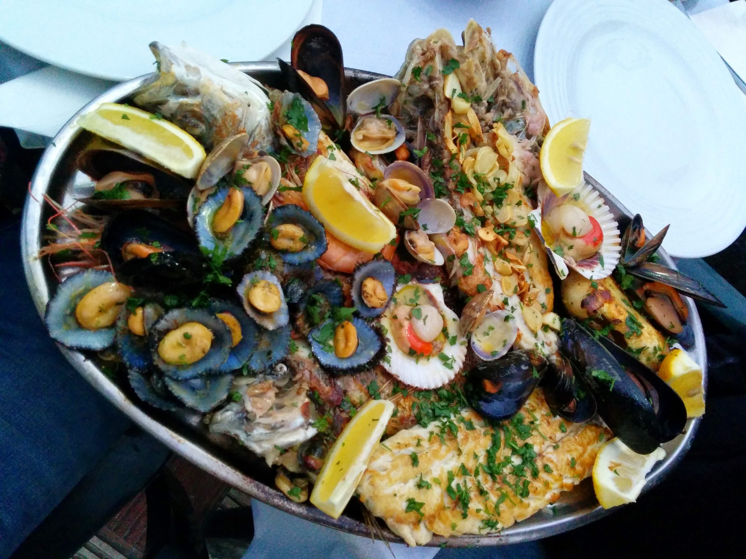 Grilled limpets as part of a large seafood platter in Madeira