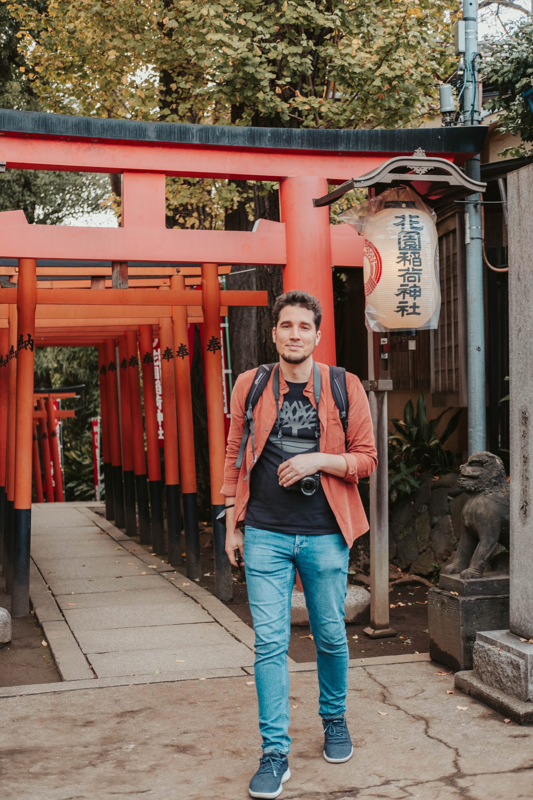Greg at the Hanazono Inari Shrine with red torii gates