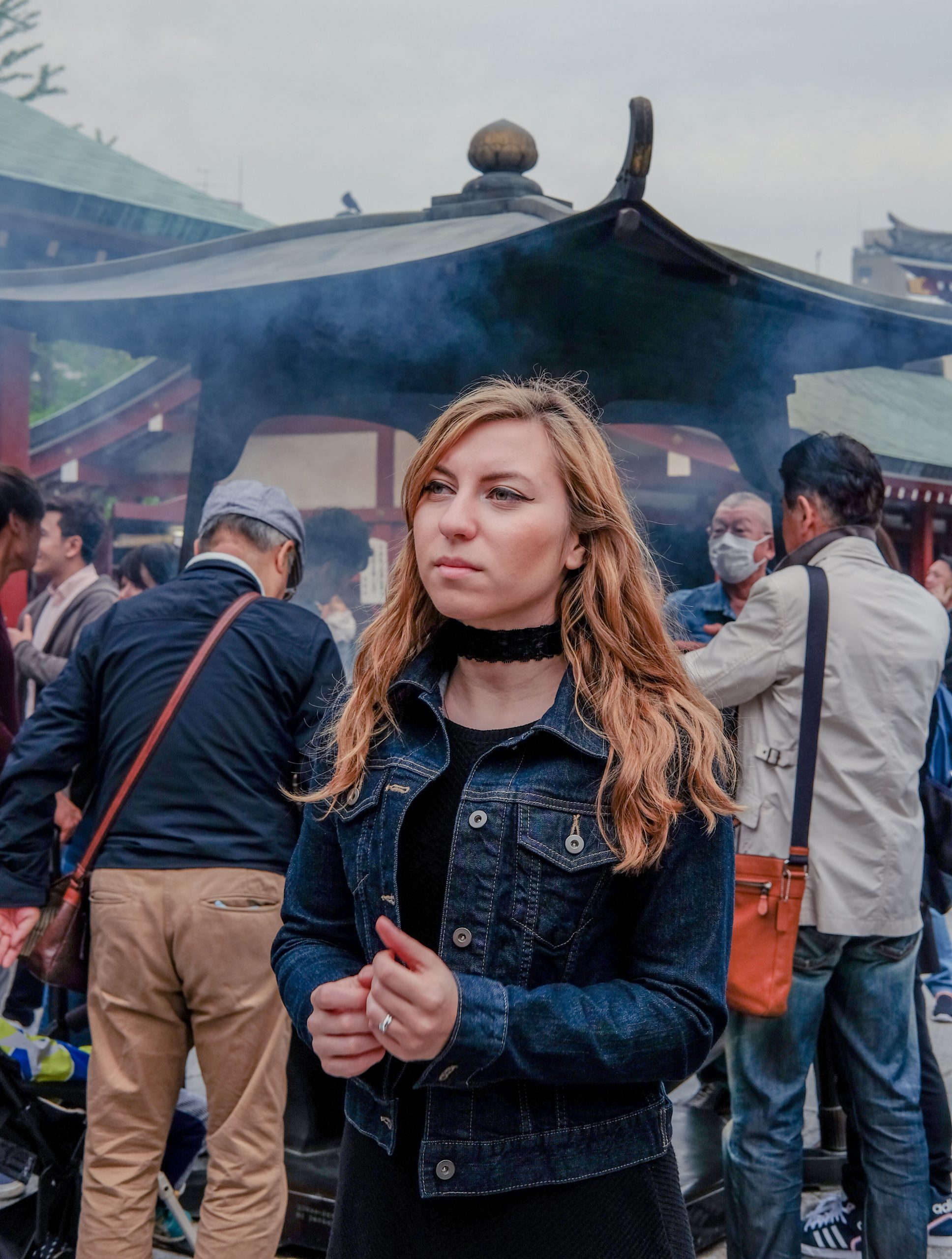 Cory surrounded by incense at senso-ji Asakusa Tokyo