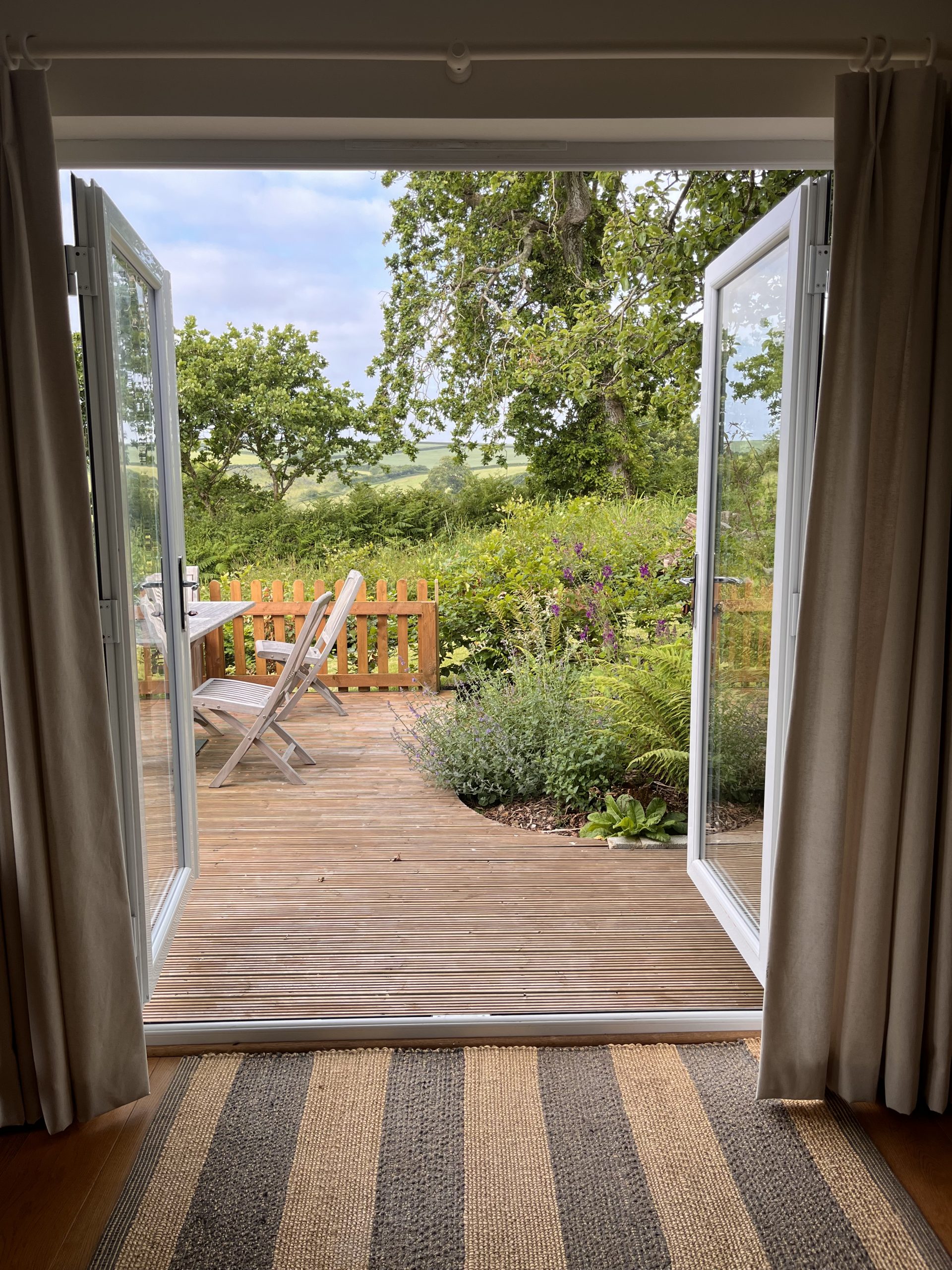 Inviting decking area at Bowden wood, our accommodation in Devon