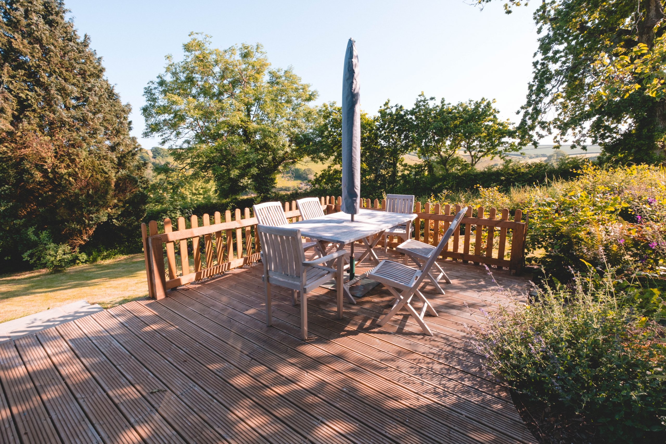 Inviting decking area to sit outside with coffee in Devon