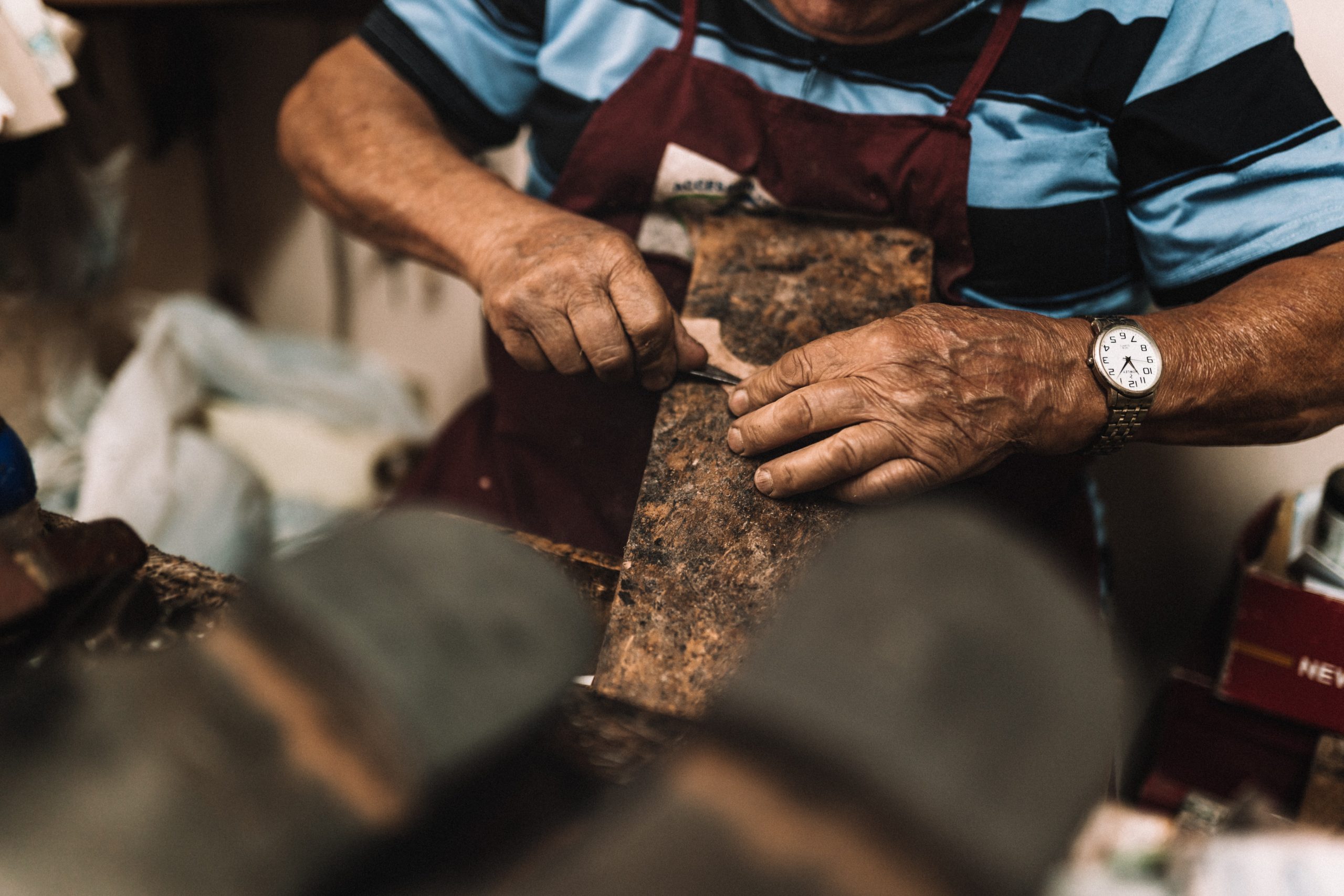Italian artisan making Italian leather shoes