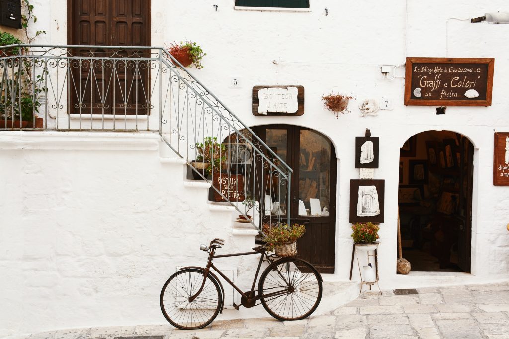 Italian bike in front of a souvenir ship in Italy