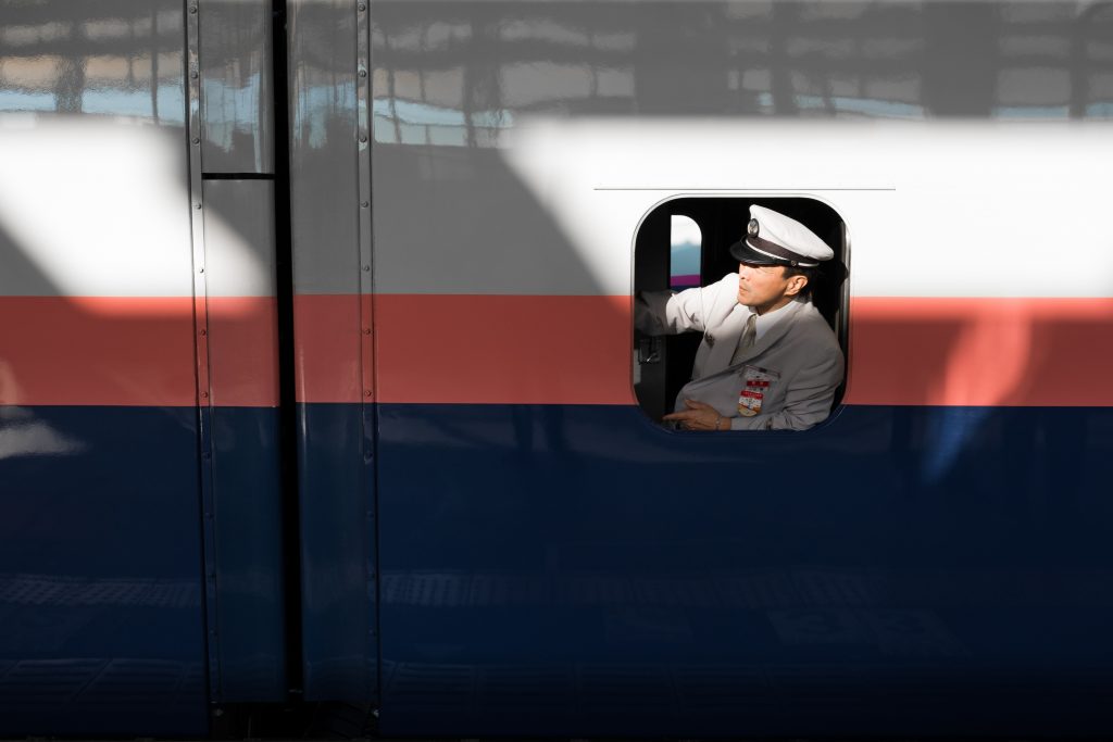 Conductor on the Japan Rail train