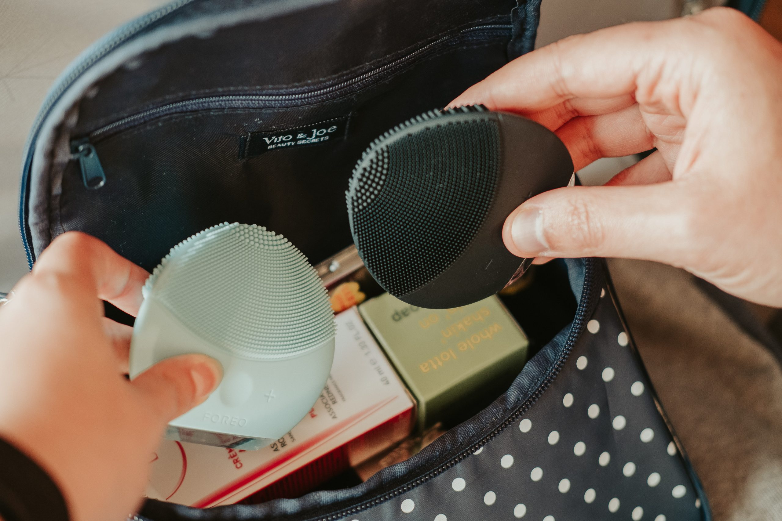 A cosmetic bag with our foreo devices in it