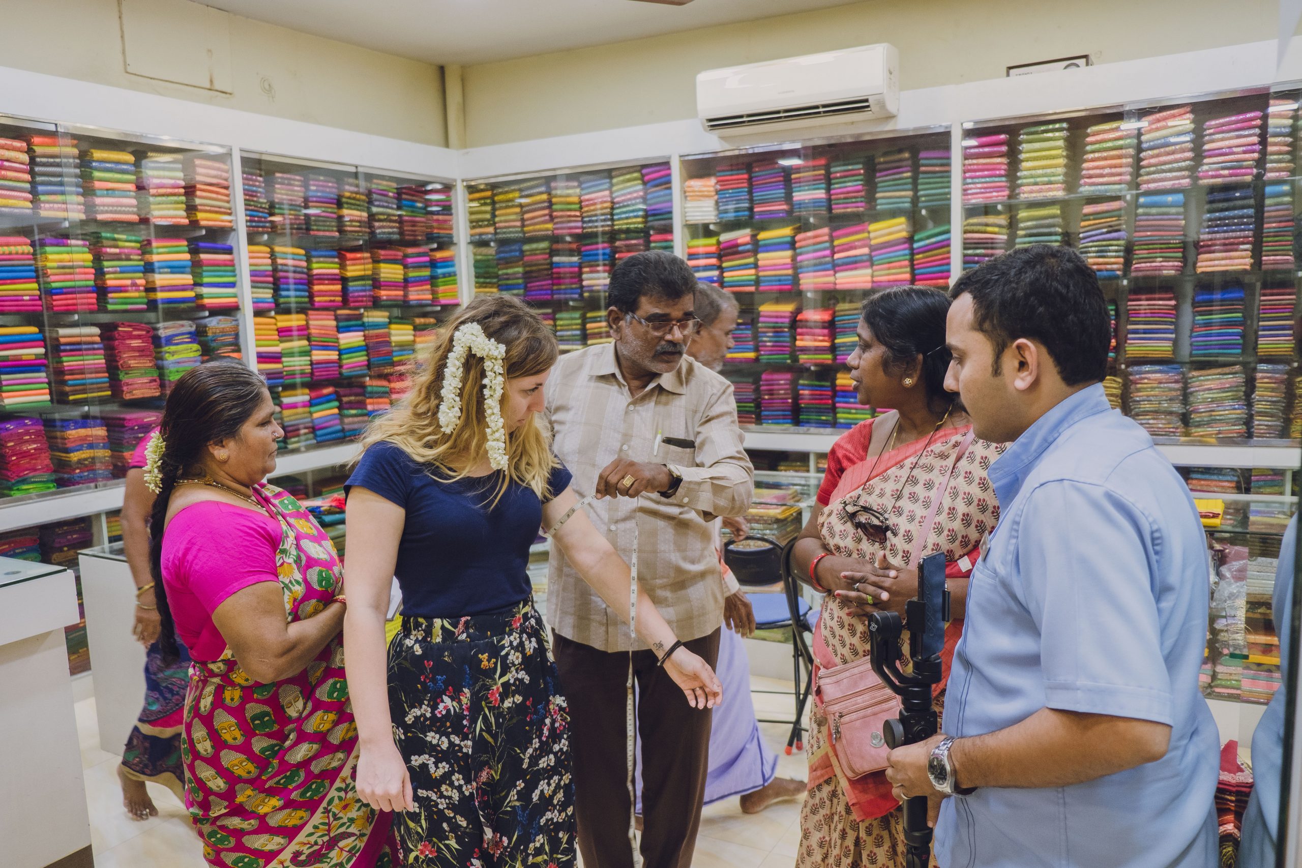 measuring Cory from You Could travel for her Indian sari