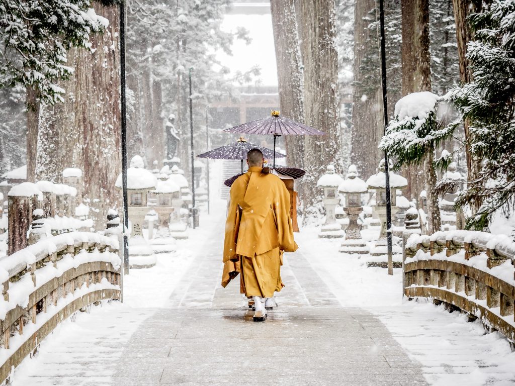 Monks walking toward Torodo Hall, Okunoin, Koyasan