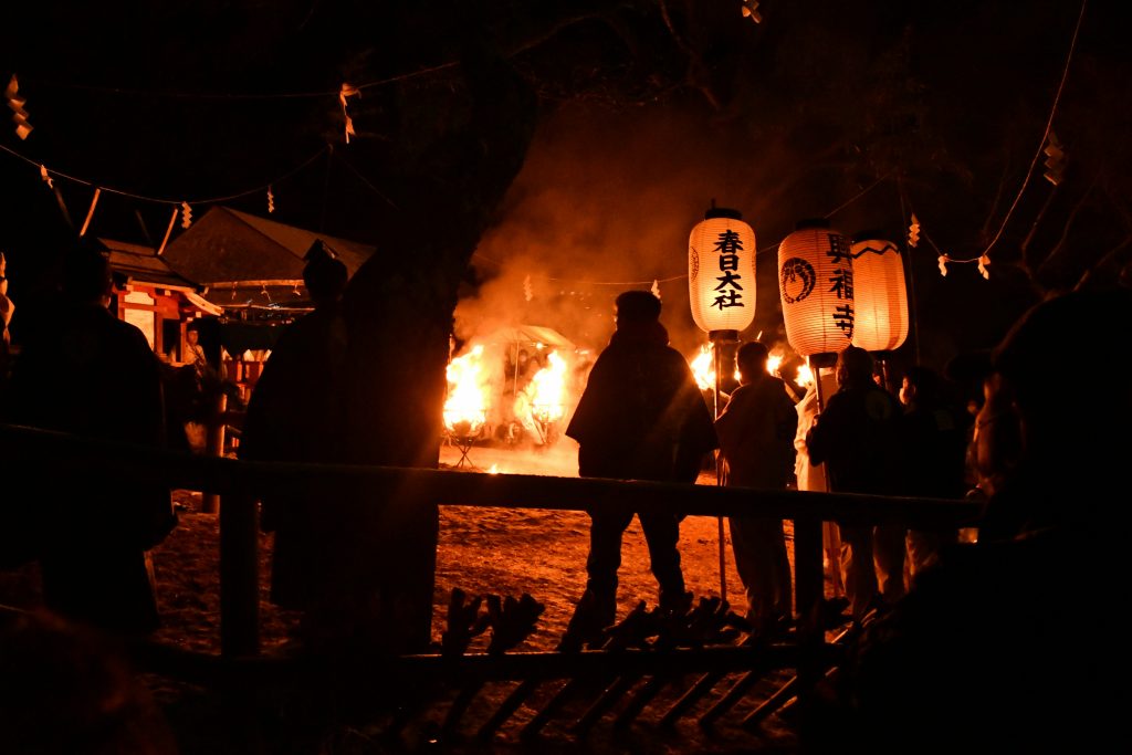 Monks chanting during the Wakakusa Yamayaki Festival in Nara, Japan