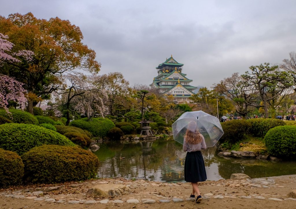 Cory admiring the Osaka Castle, one of the top attractions in Osaka