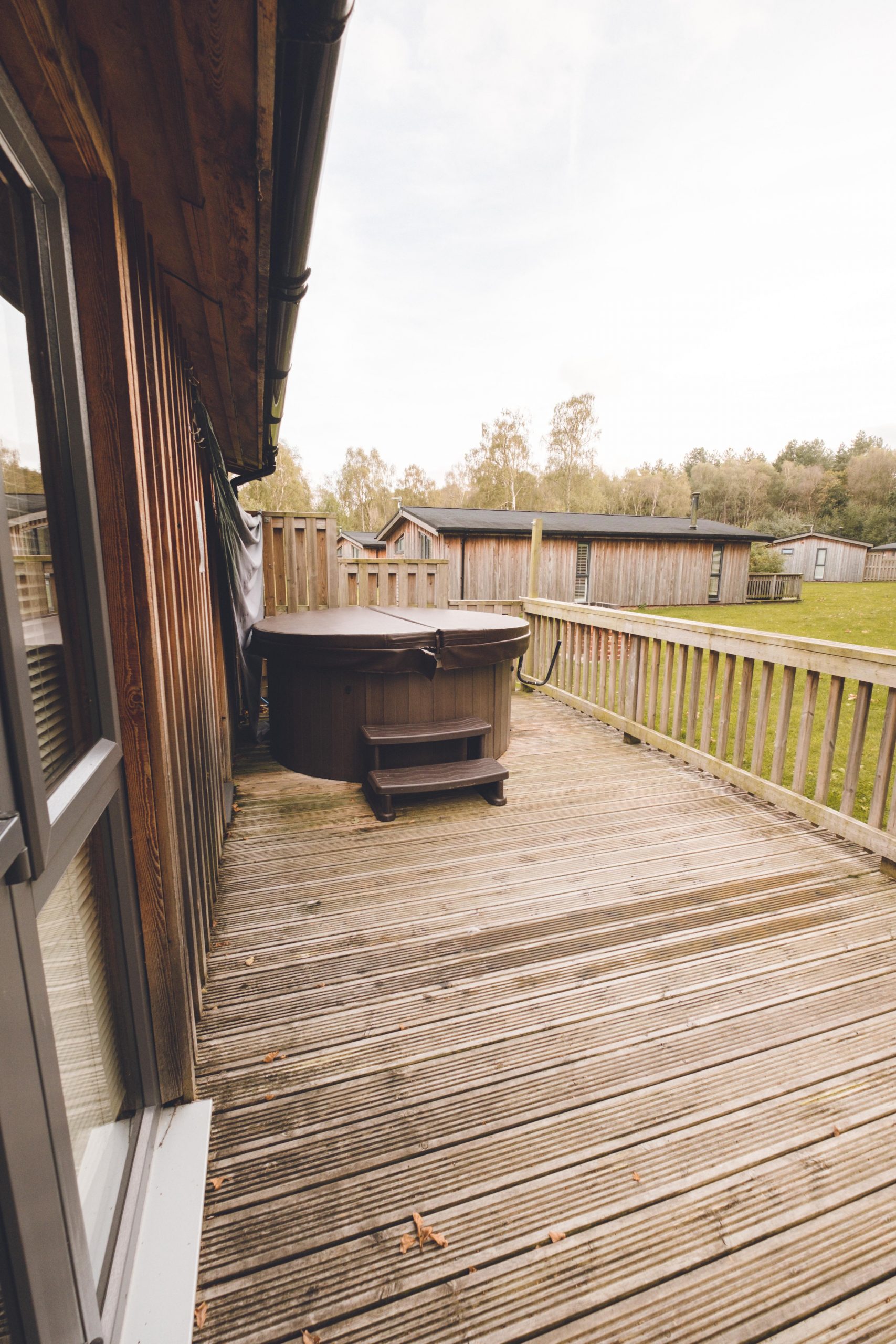 outdoor patio with hot tub at the sherwood hideaway
