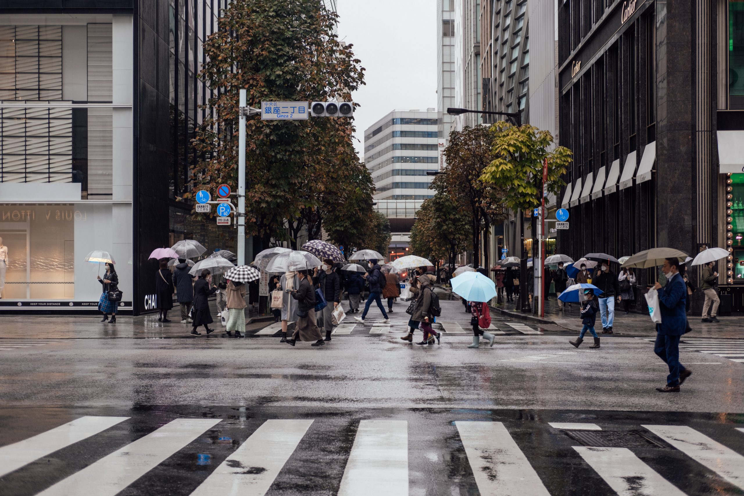 People crossing an intersection in Ginza People crossing an intersection in Ginza