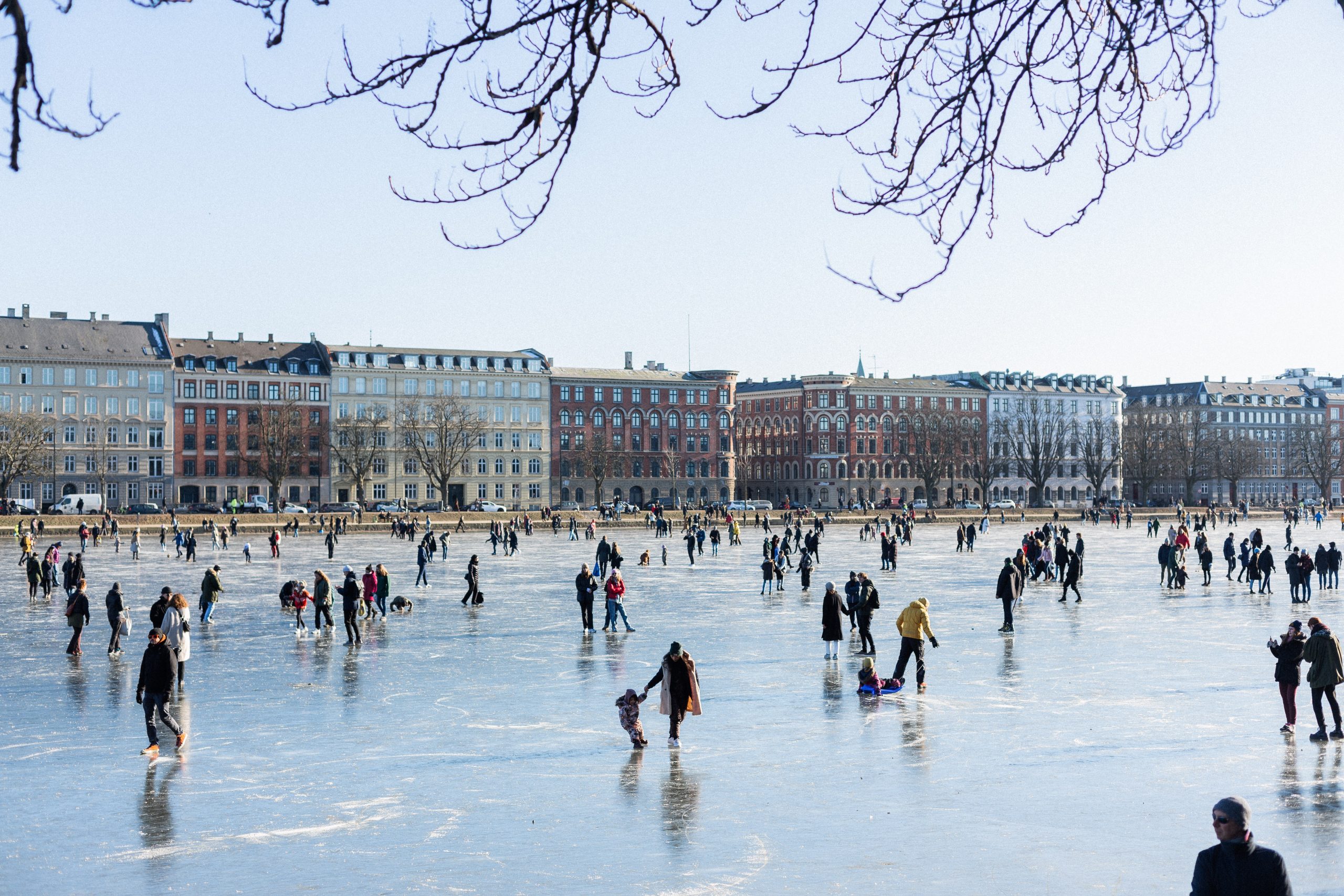 People ice skating in the winter in Copenhagen