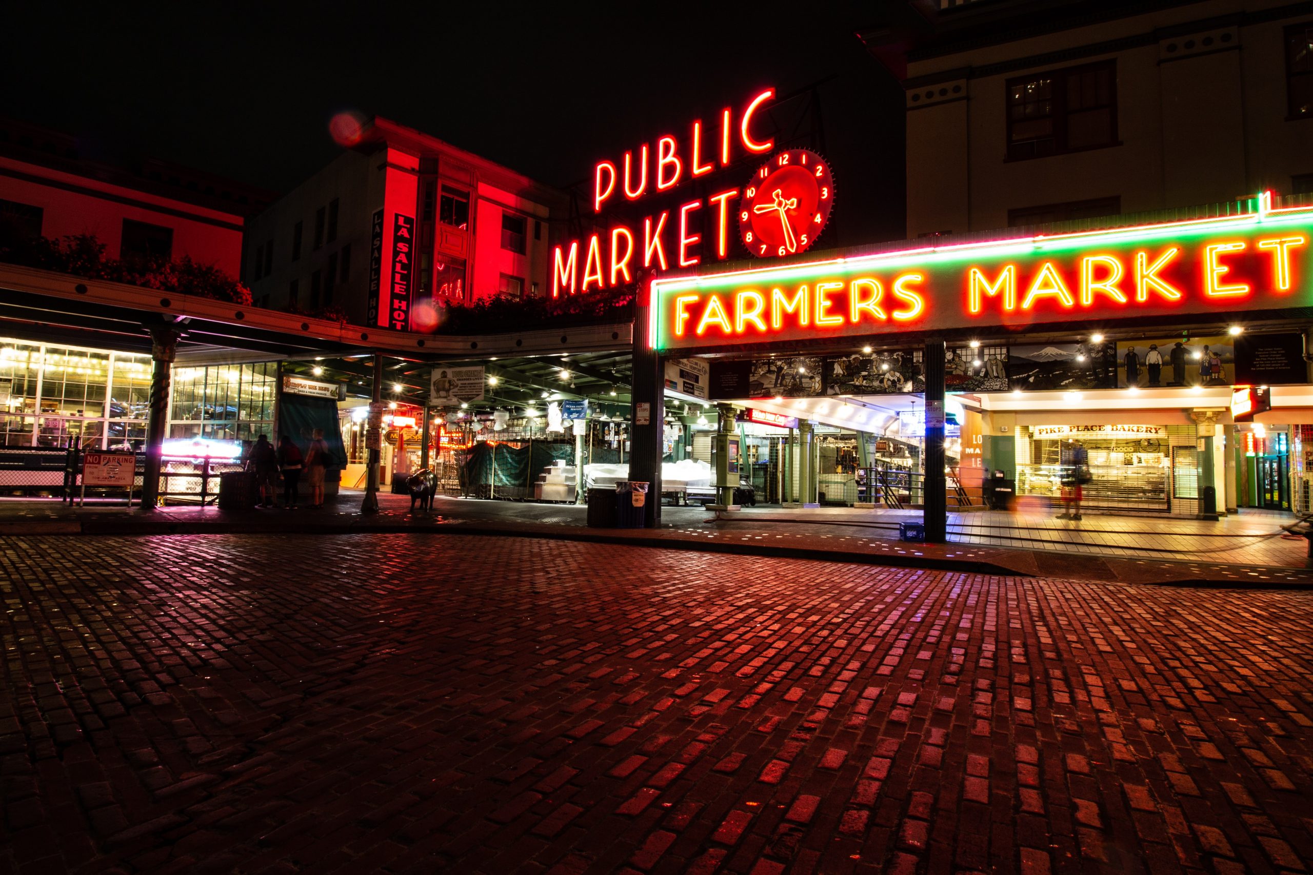 Pike place market in the evening - stay nearby to be close to most attractions in Seattle Pike place market in the evening - stay nearby to be close to most attractions in Seattle