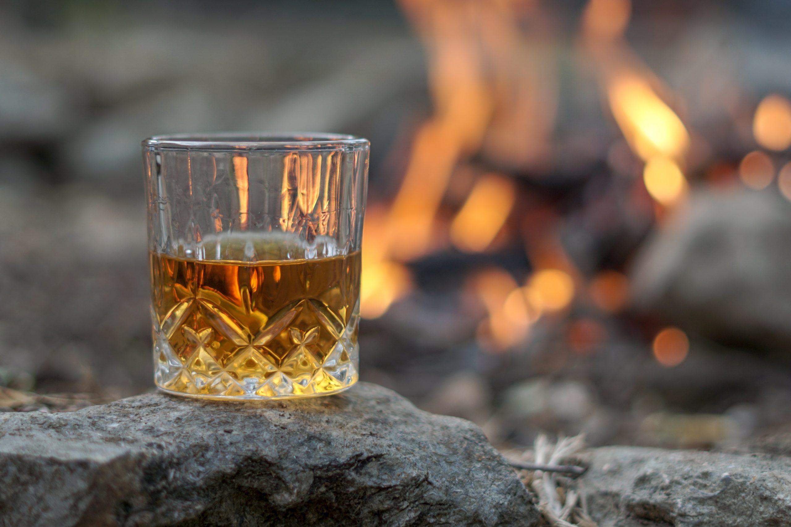 Pulteney Distillery - drinking whisky from a glass Pulteney Distillery - drinking whisky from a glass