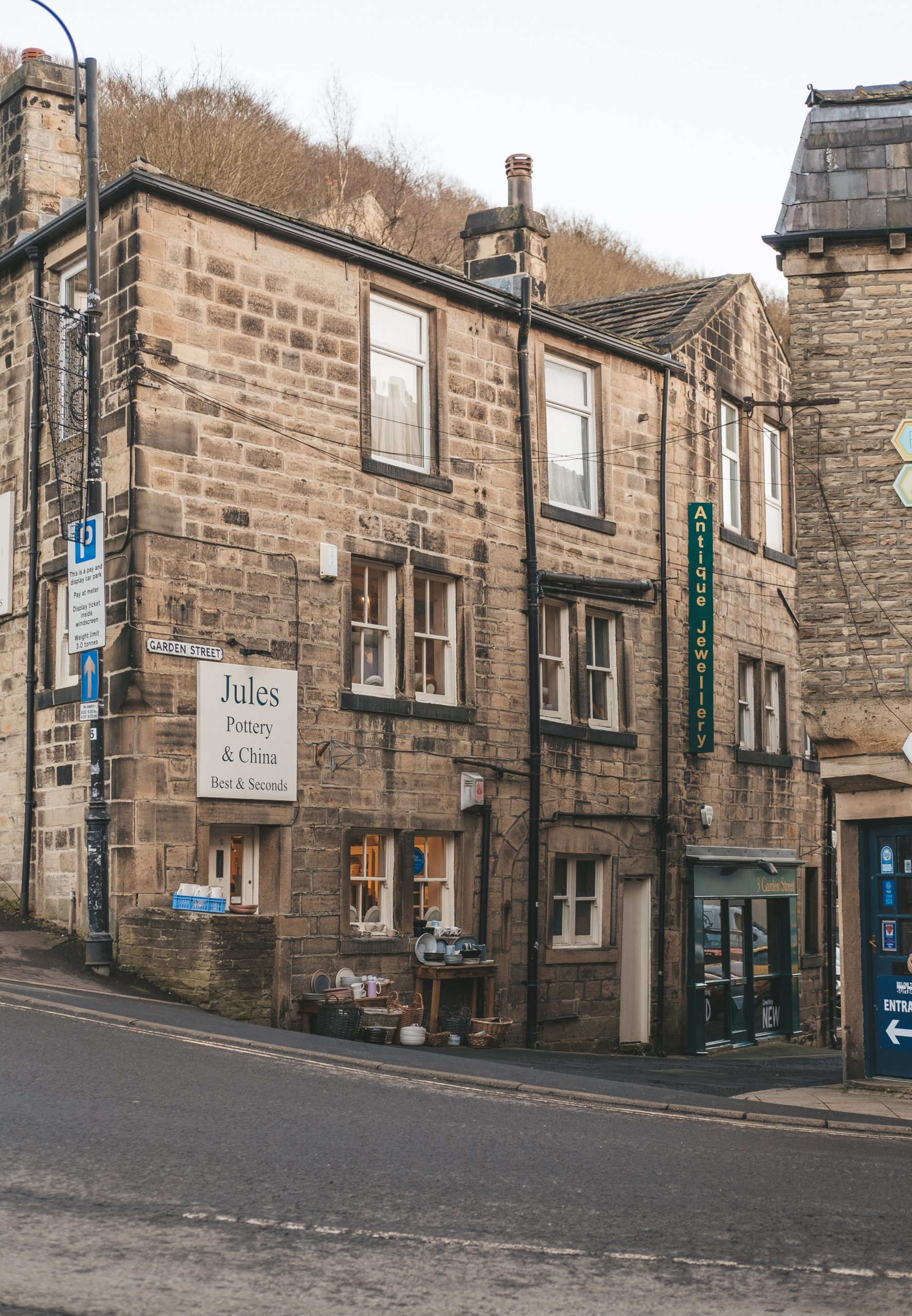 Quaint little street with plates, pots and gifts in Hebden Bridge
