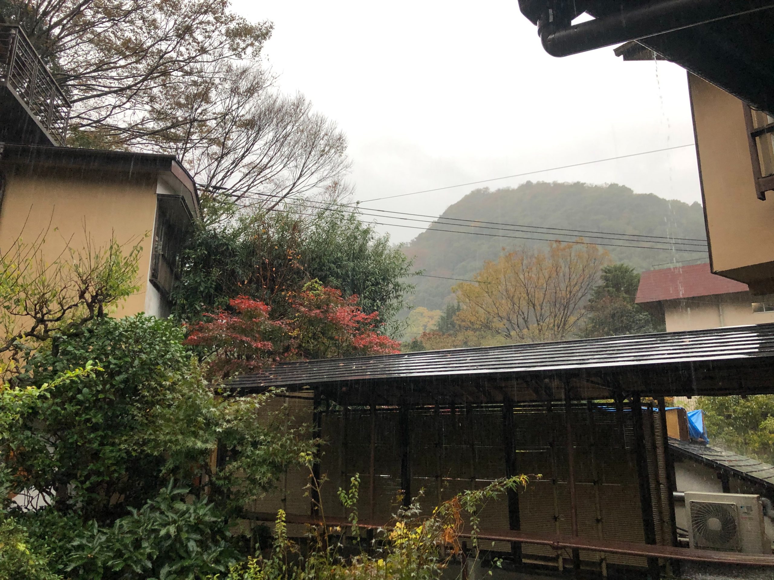 Rainy day in Hakone over traditional ryokan