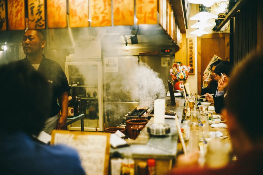 Restaurant in Omoide Yokocho grilling meat