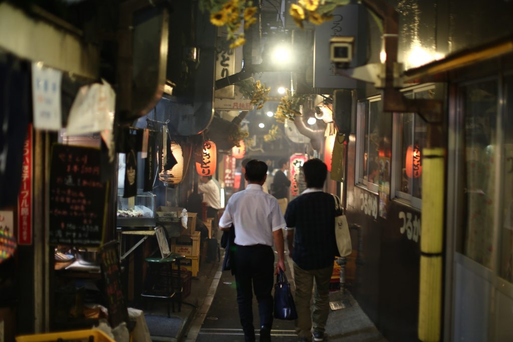 Salarymen in Japan searching for fun things to do in Shinjuku