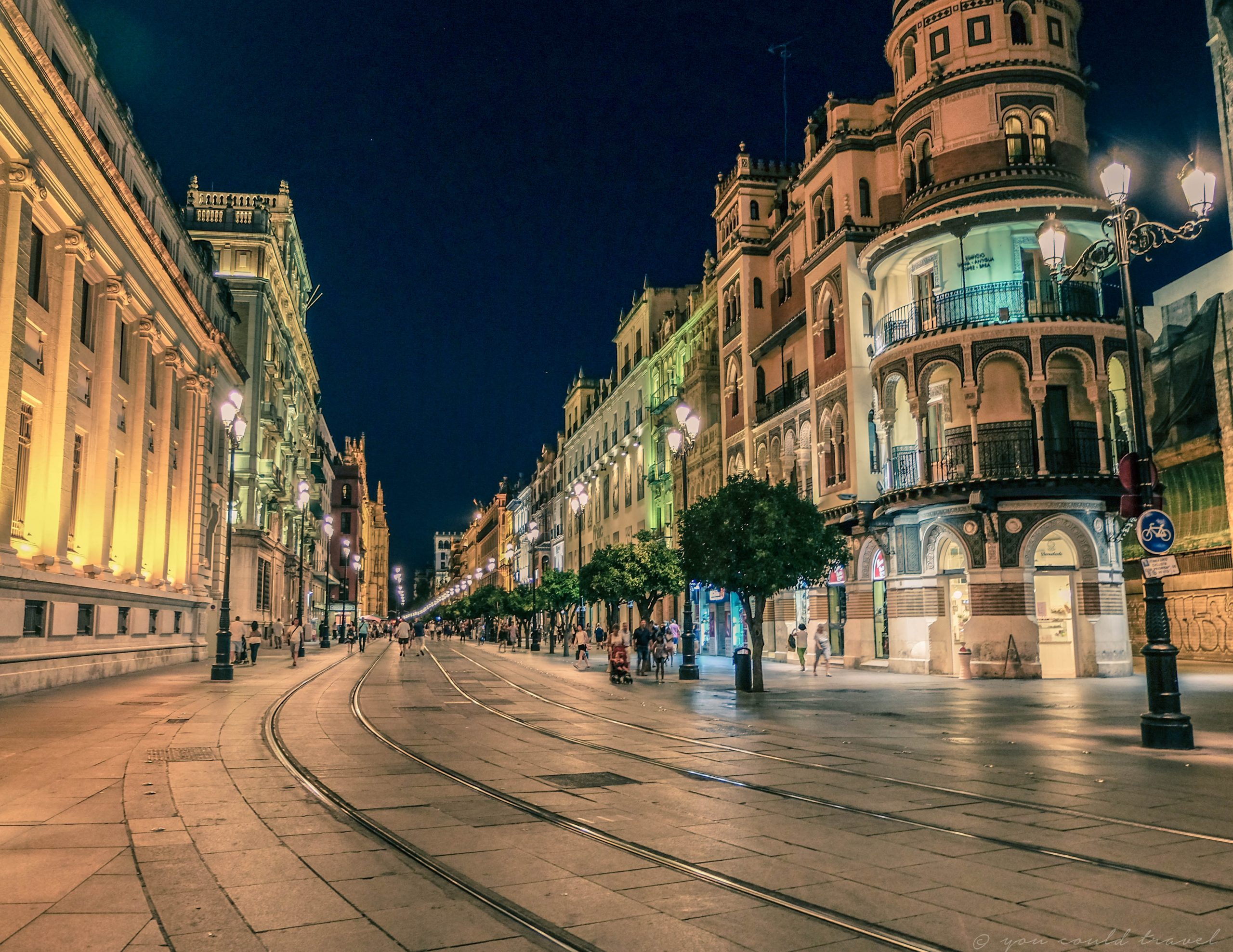 The tram line along the main boulevard in the centre of Seville Spain The tram line along the main boulevard in the centre of Seville Spain