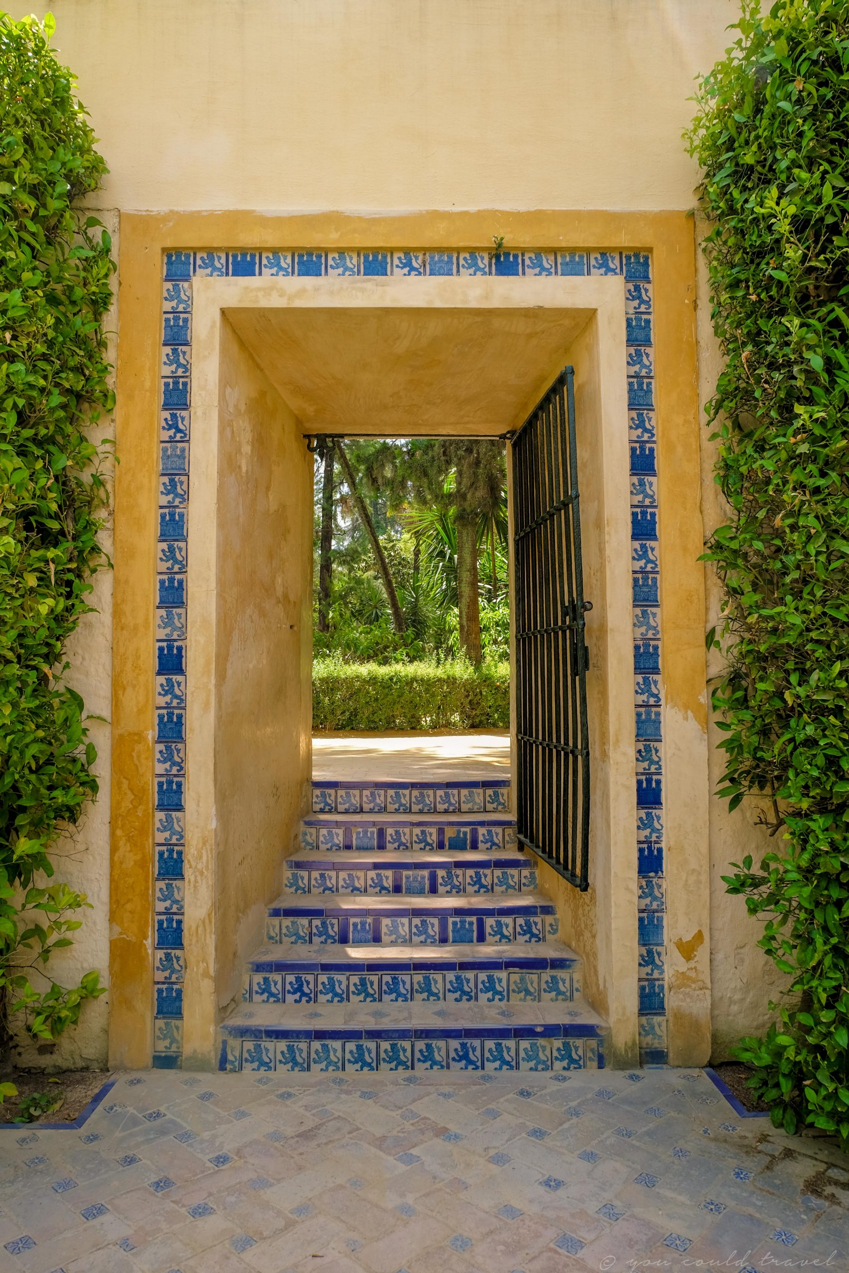 A doorway which leads to more vegetation in Seville Spain